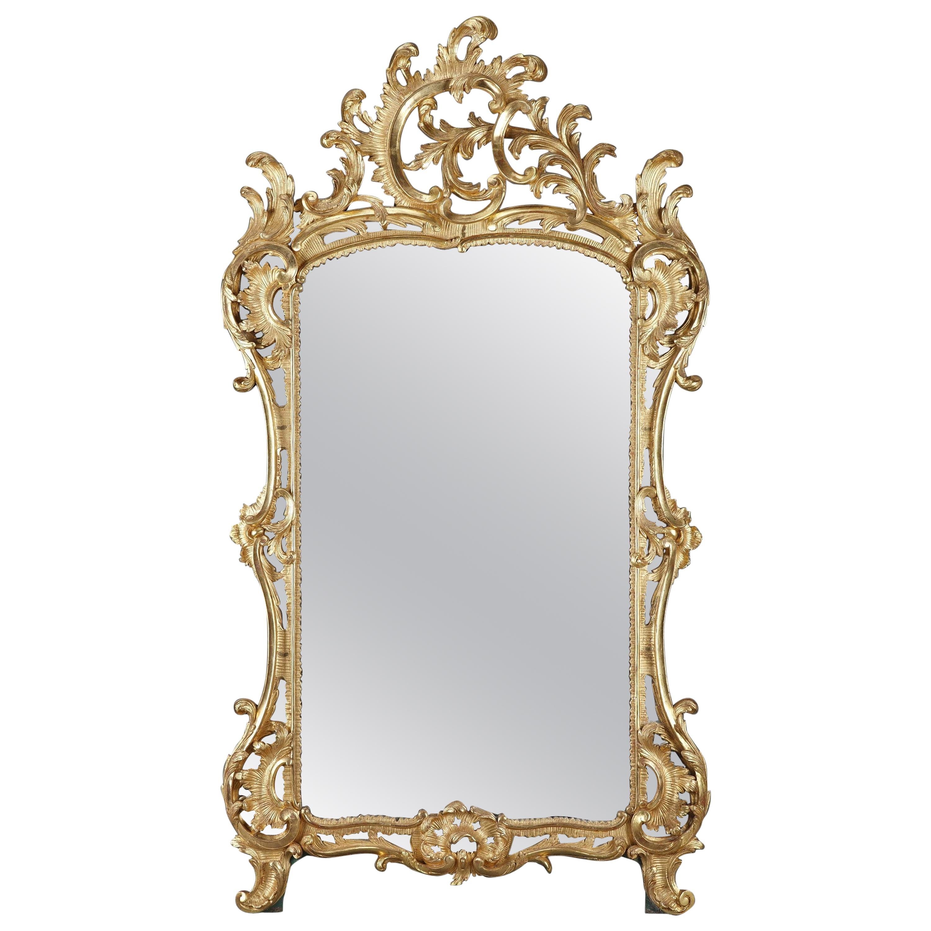 Miroir en bois doré de style baroque