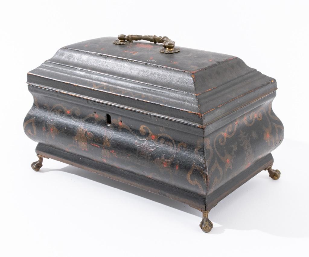 Baroque style brass-mounted Japanned casket, late 19th century, with domed and molded top with rocaille-cast brass handle, above a convex shaped body on brass claw and ball feet, the whole japanned black with with Chinoiserie figures to front,