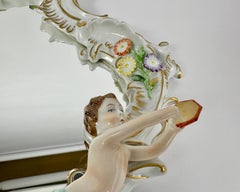 Baroque Style Mirror in Porcelain with Musical Putti 20th Century by PMP GDR
