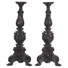 Baroque-Style Ornate Metal Candlesticks with Cherub, Volute and Garland Motifs