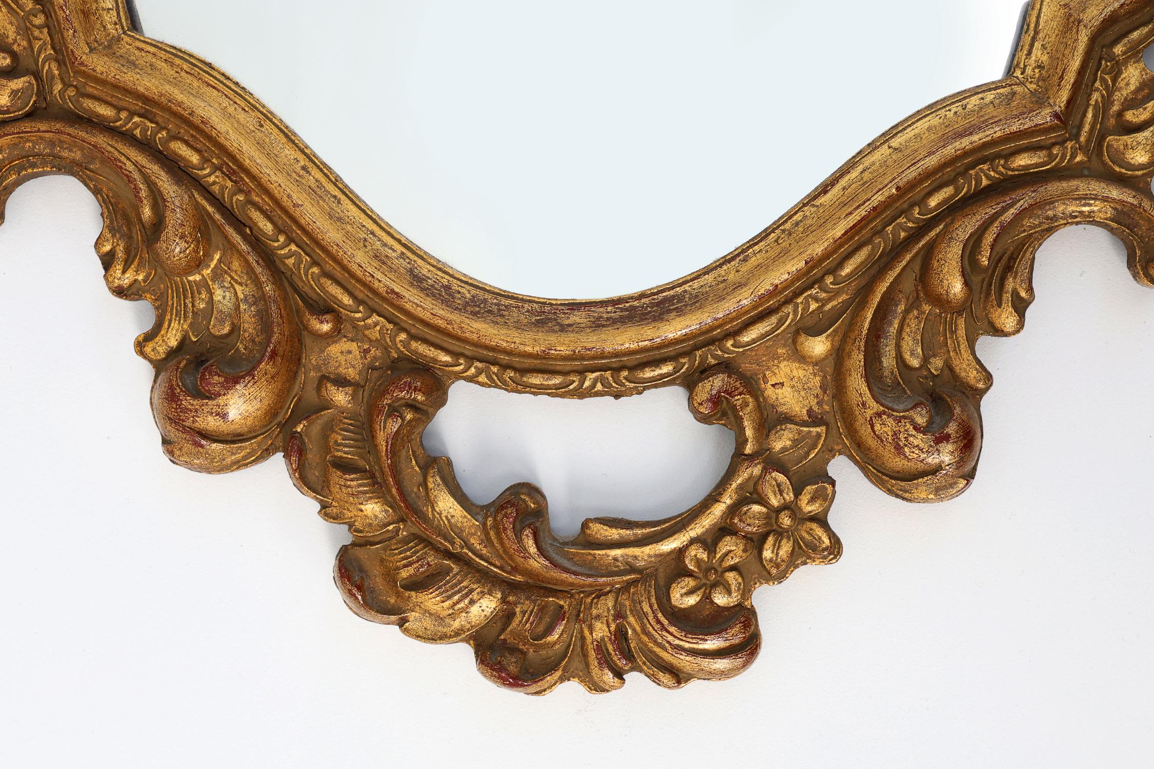 Baroque Revival Baroque style oval wall mirror in gilded wood, France For Sale