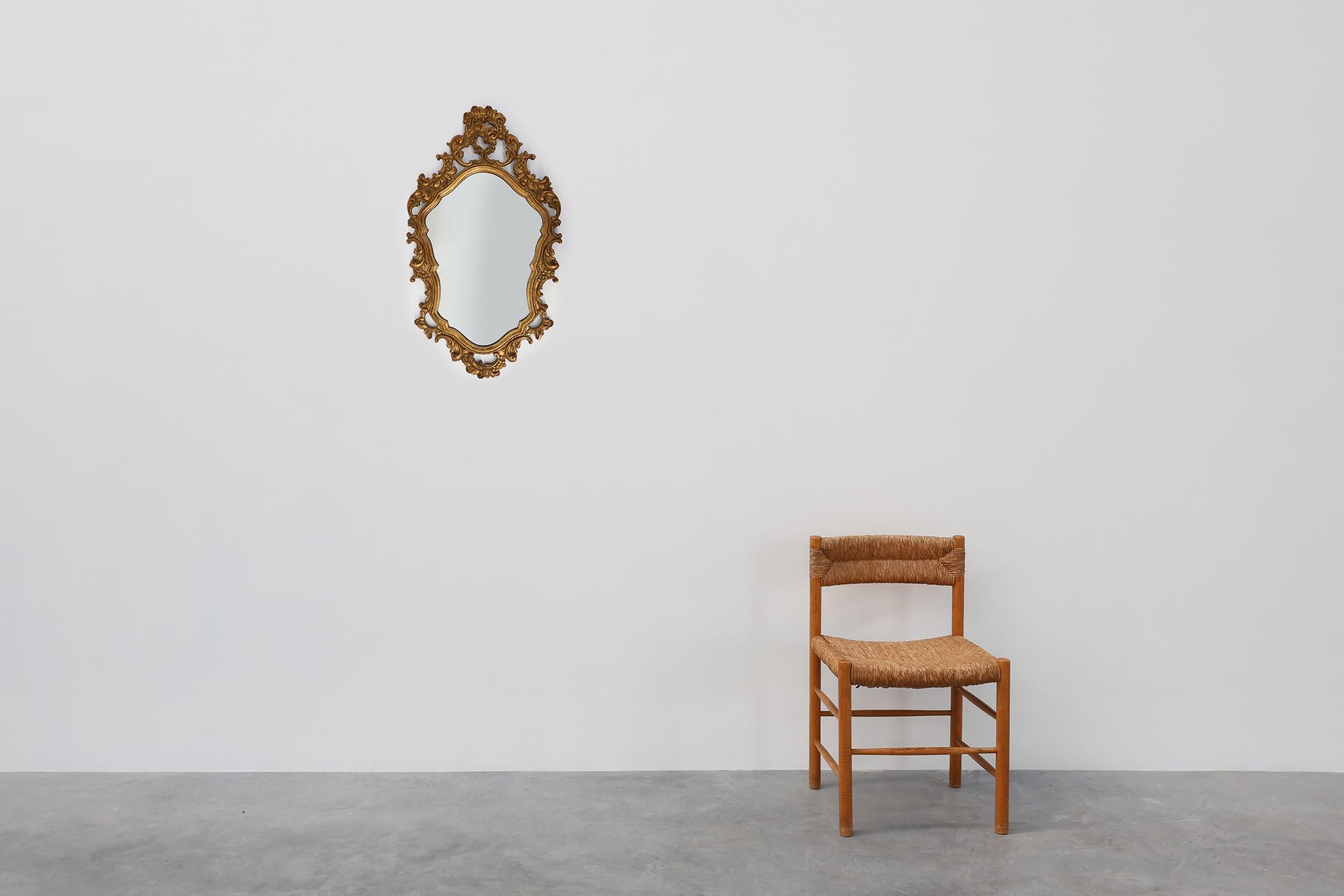 Gilt Baroque style oval wall mirror in gilded wood, France For Sale