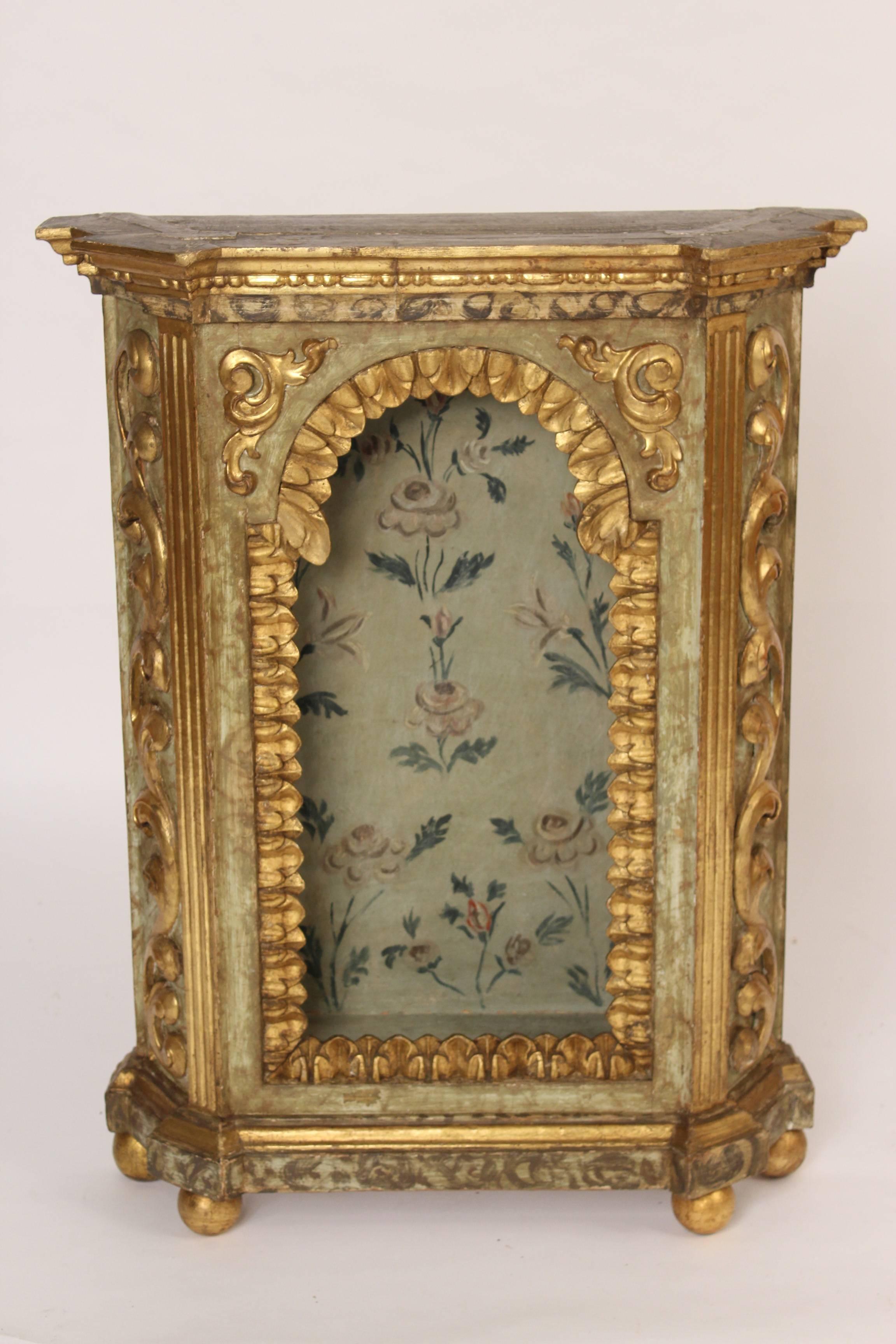 Baroque style painted and partial gilt niche cabinet, late 19th century.