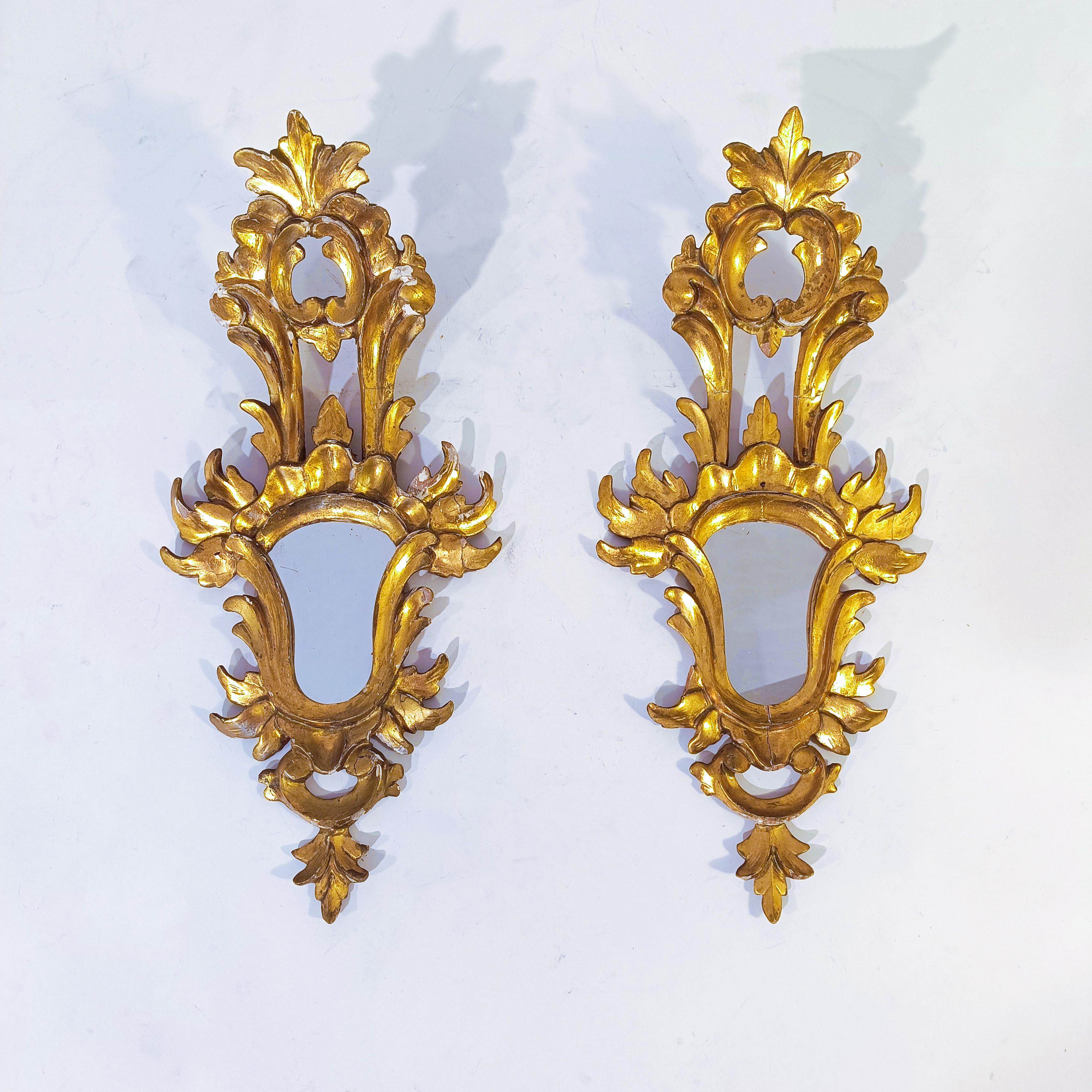French Baroque style. Pair of gilded cornucopia mirrors, France, 1920s For Sale