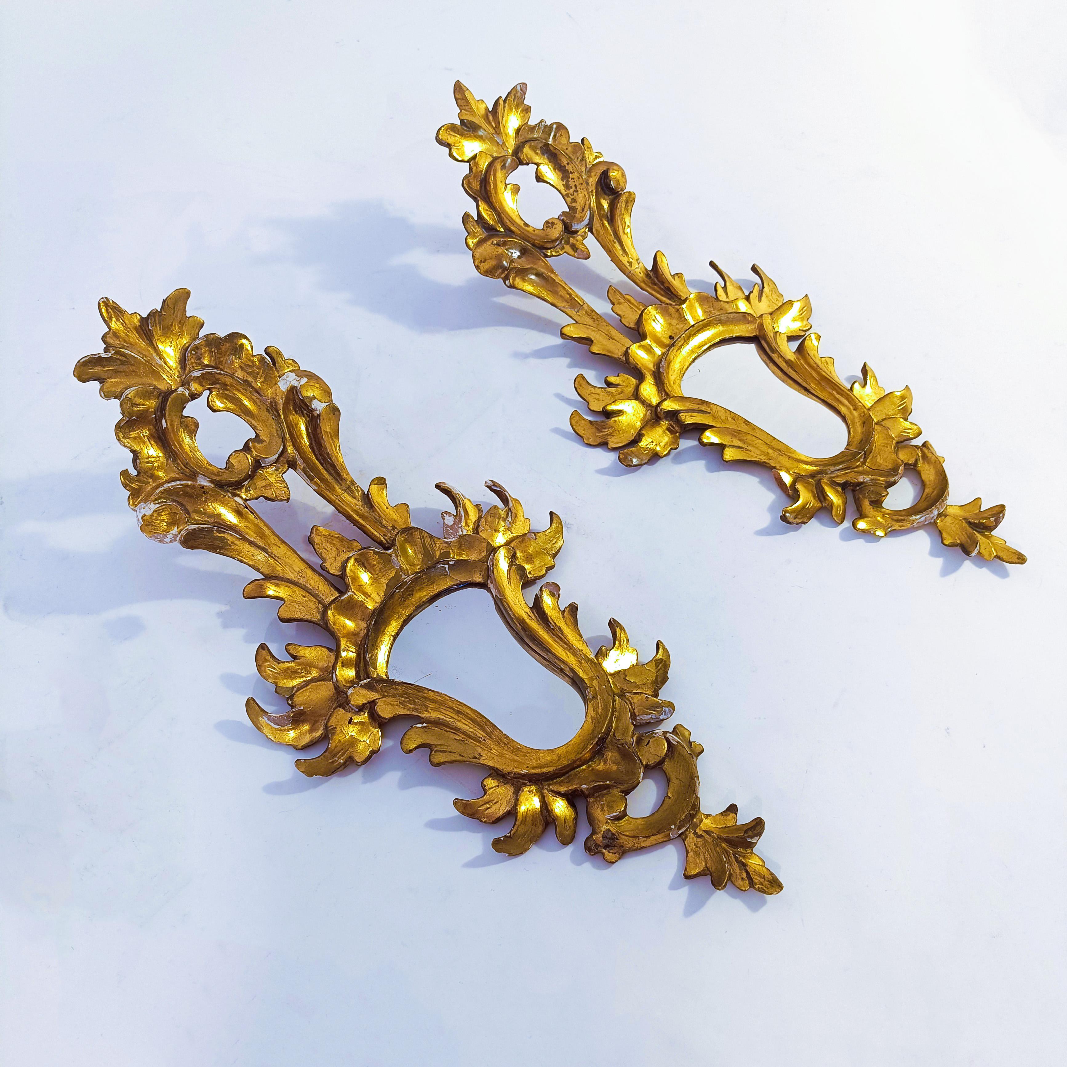 Hand-Carved Baroque style. Pair of gilded cornucopia mirrors, France, 1920s For Sale