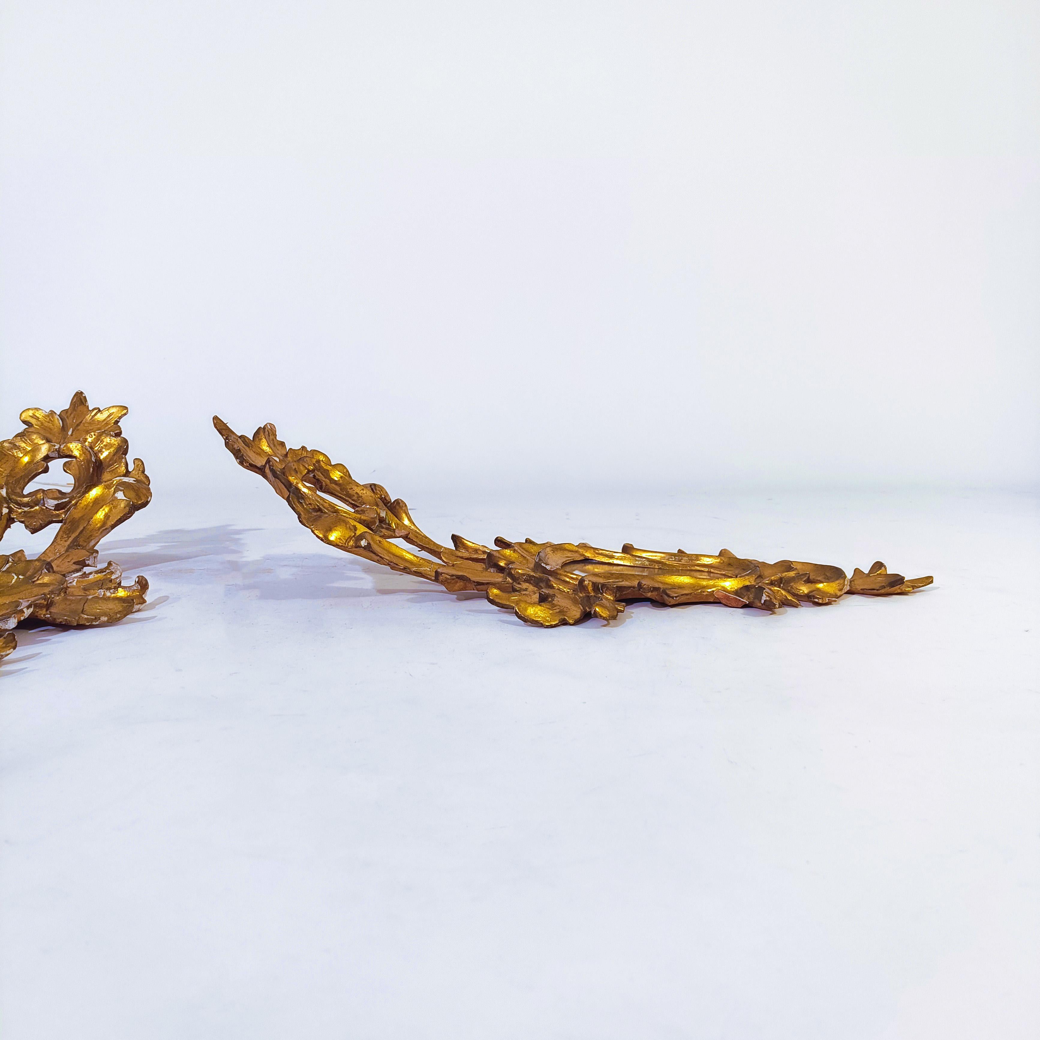 Mid-20th Century Baroque style. Pair of gilded cornucopia mirrors, France, 1920s For Sale