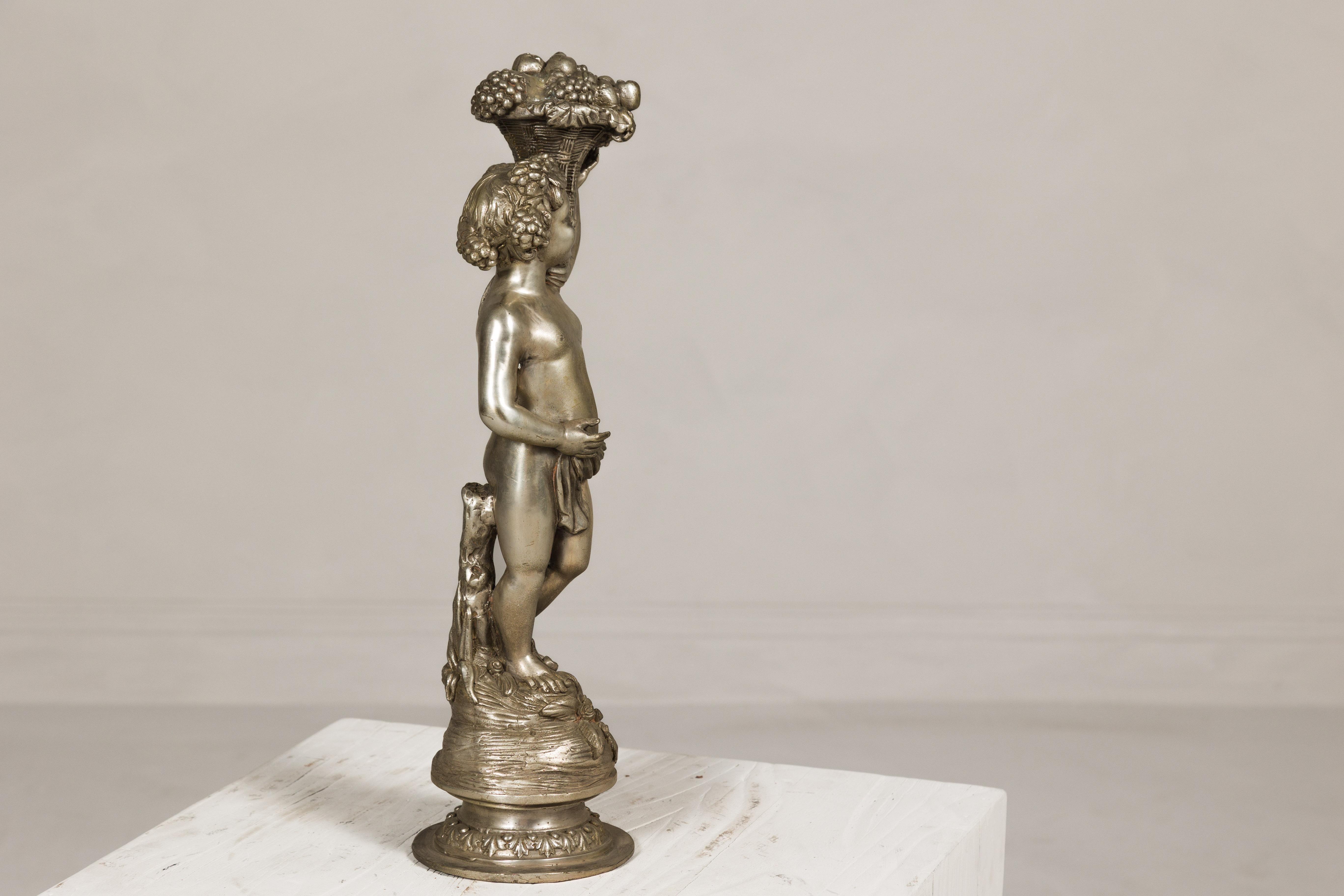 Baroque Style Silvered Bronze Statuette of a Putto Carrying a Fruit Basket For Sale 6