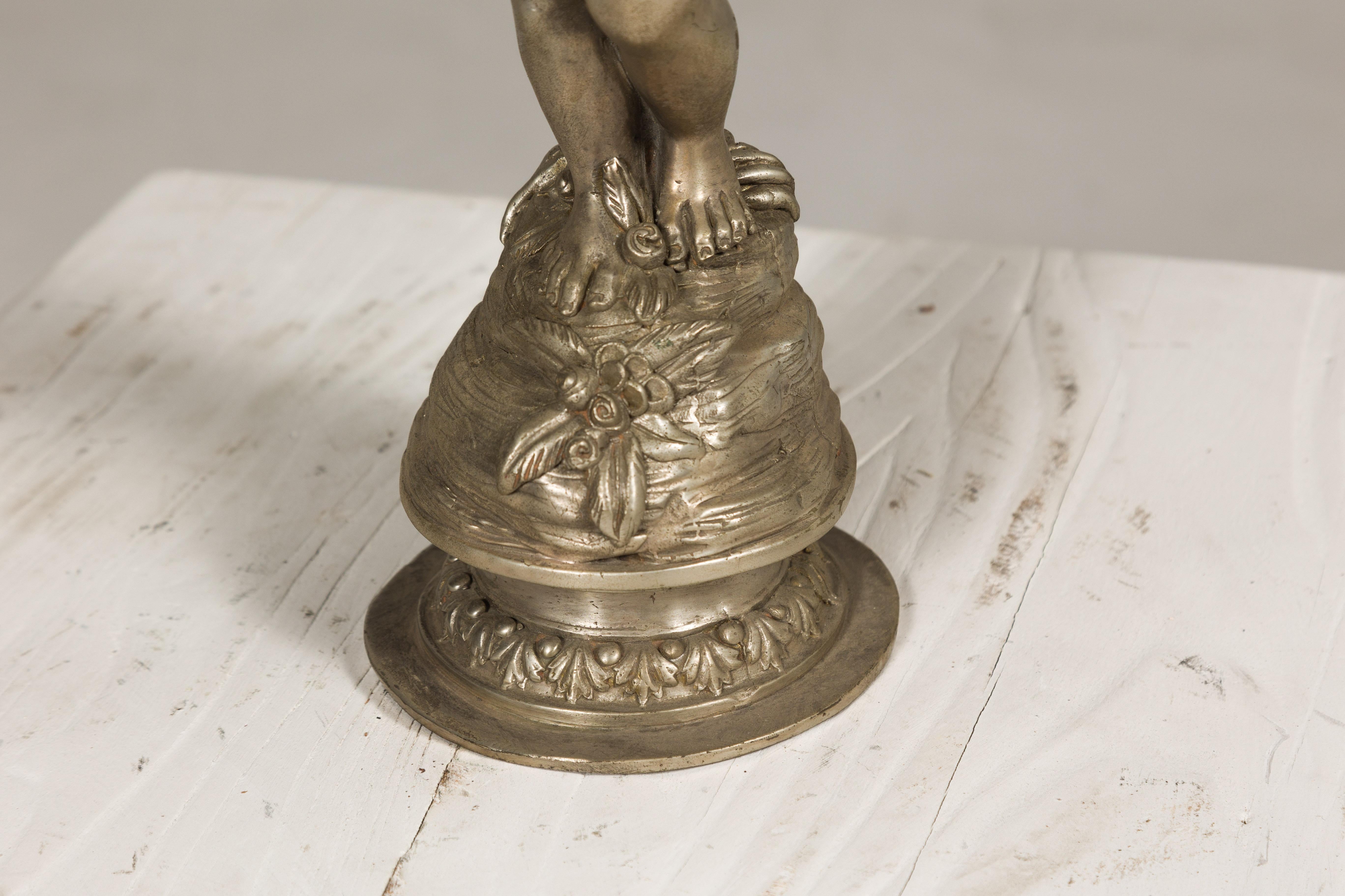 Baroque Style Silvered Bronze Statuette of a Putto Carrying a Fruit Basket For Sale 5