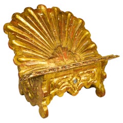 Baroque-style table lectern in carved and gilded wood, 18th century.