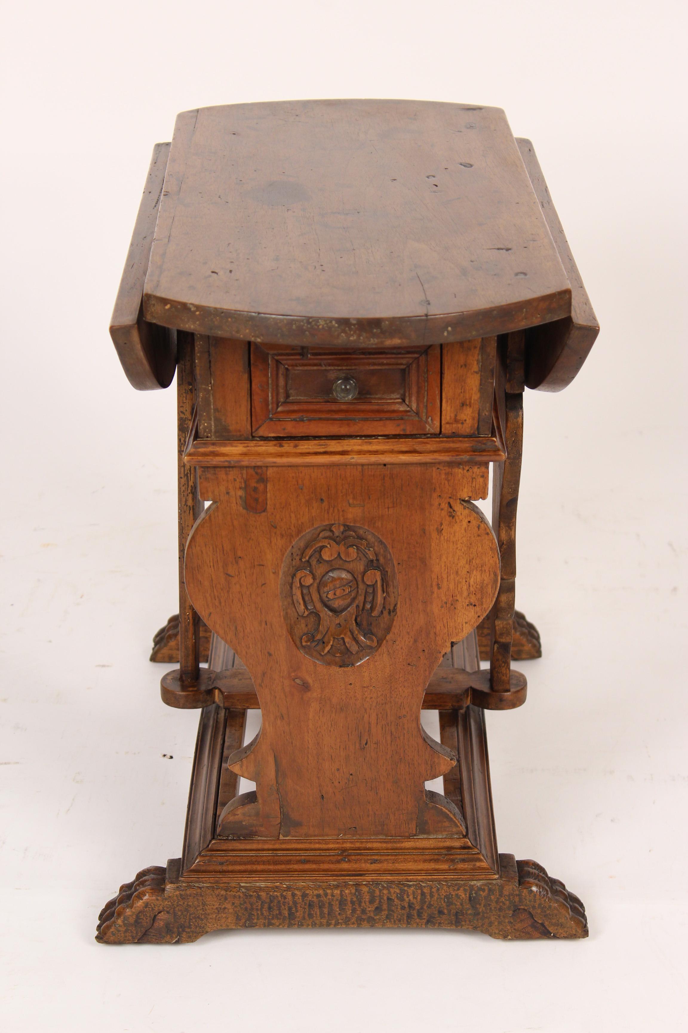 Baroque style walnut drop-leaf occasional table, made from 18th century and later elements, assembled, circa 1930s. Dimensions as photographed, height 20
