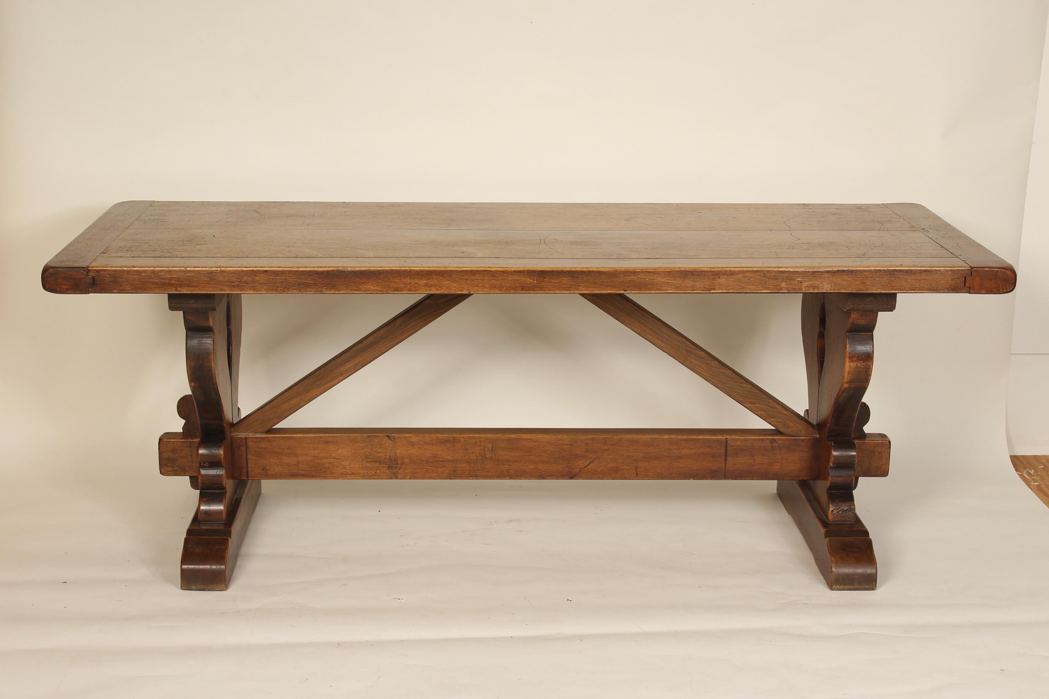 Baroque style walnut plank top dining room table, mid-20th century. The top has nice color and is 2.25