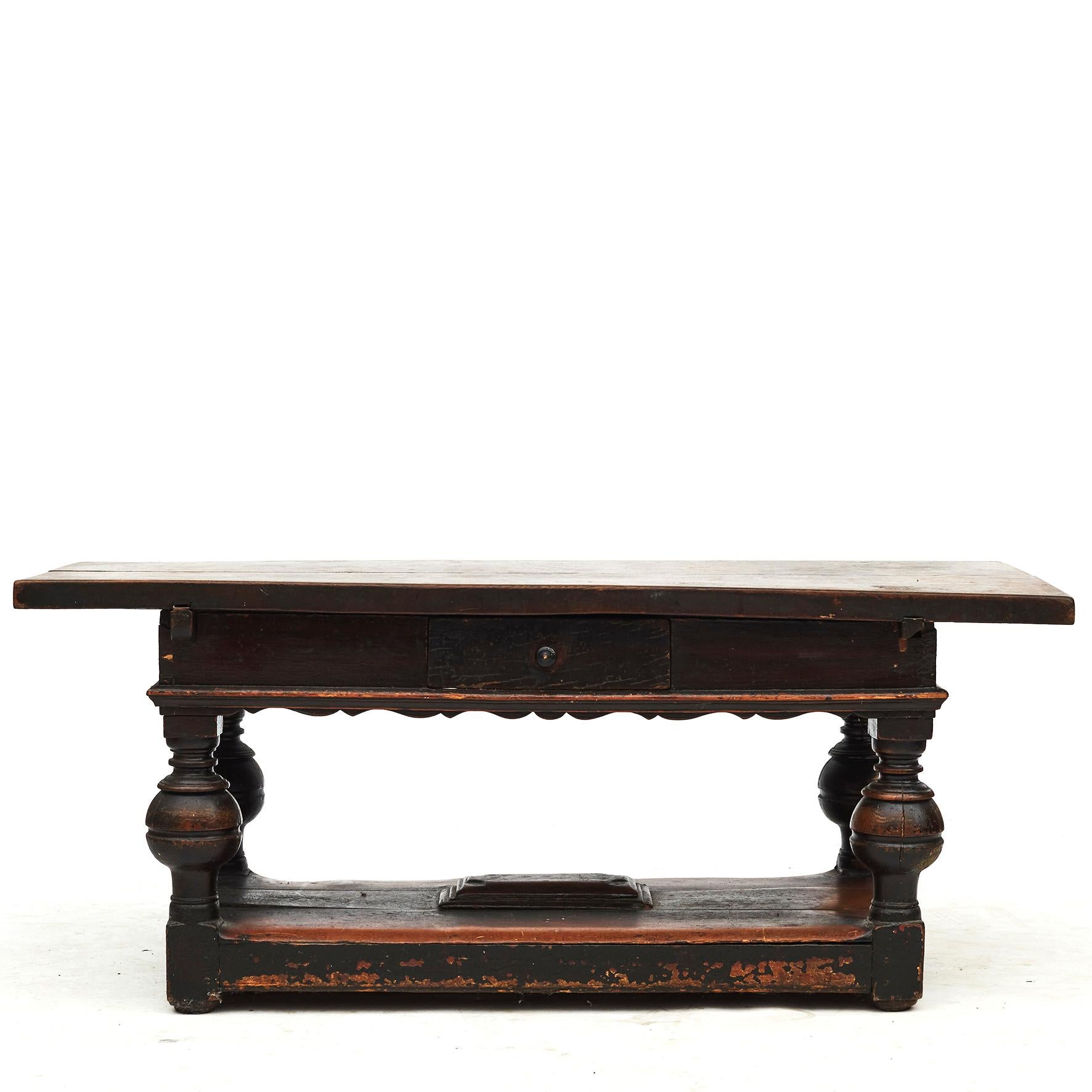Baroque table with a thick tabletop in oak (6 cm) in two pieces of wood.
Base made of pine with brown color.
Appears untouched with natural beautiful age-related patina.
Denmark, 1720-1750
