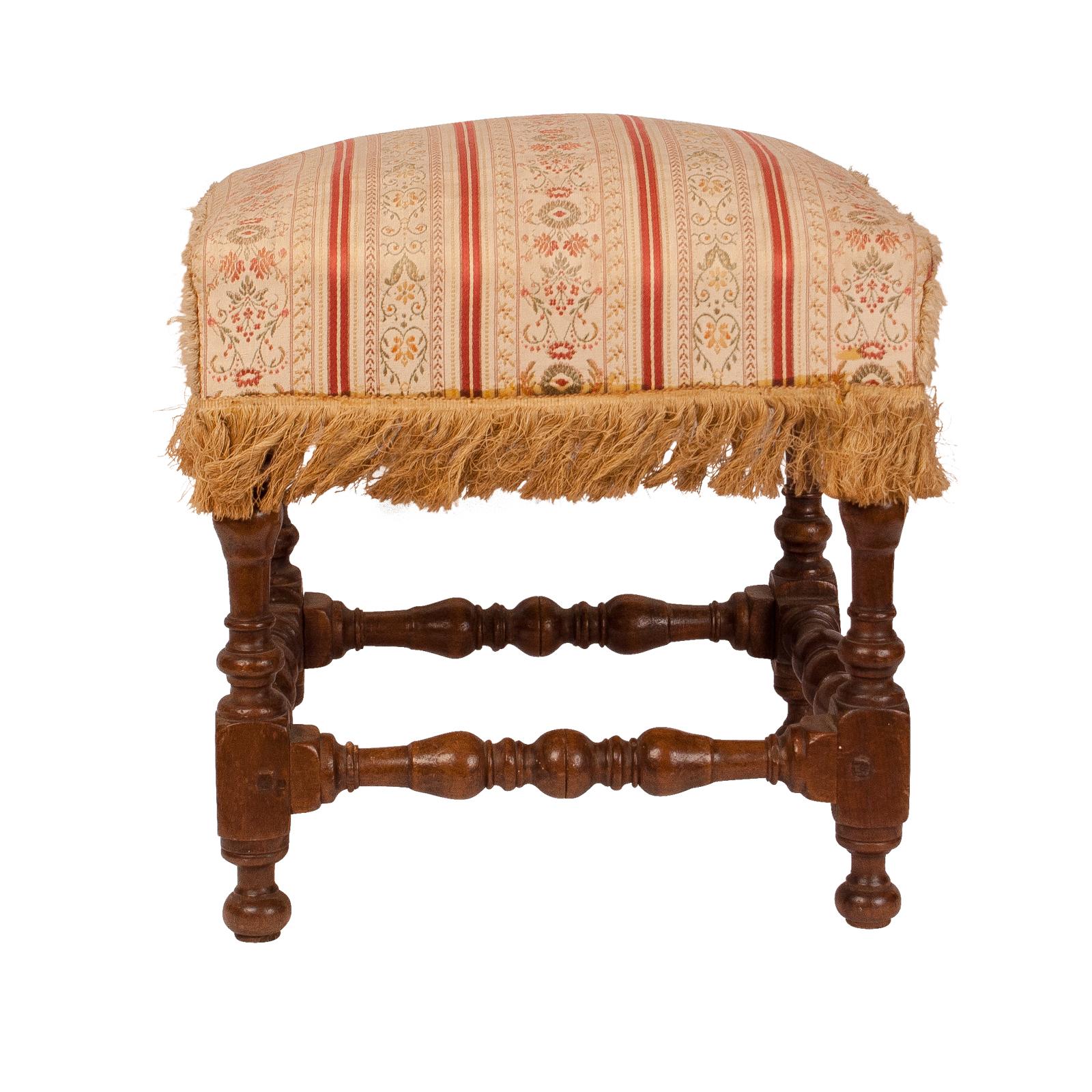 A mid-17th century walnut Baroque stool with turned legs. Spanish or Italian from a very good old collection.