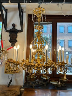 Lampadario barocco in legno con policromia dorata