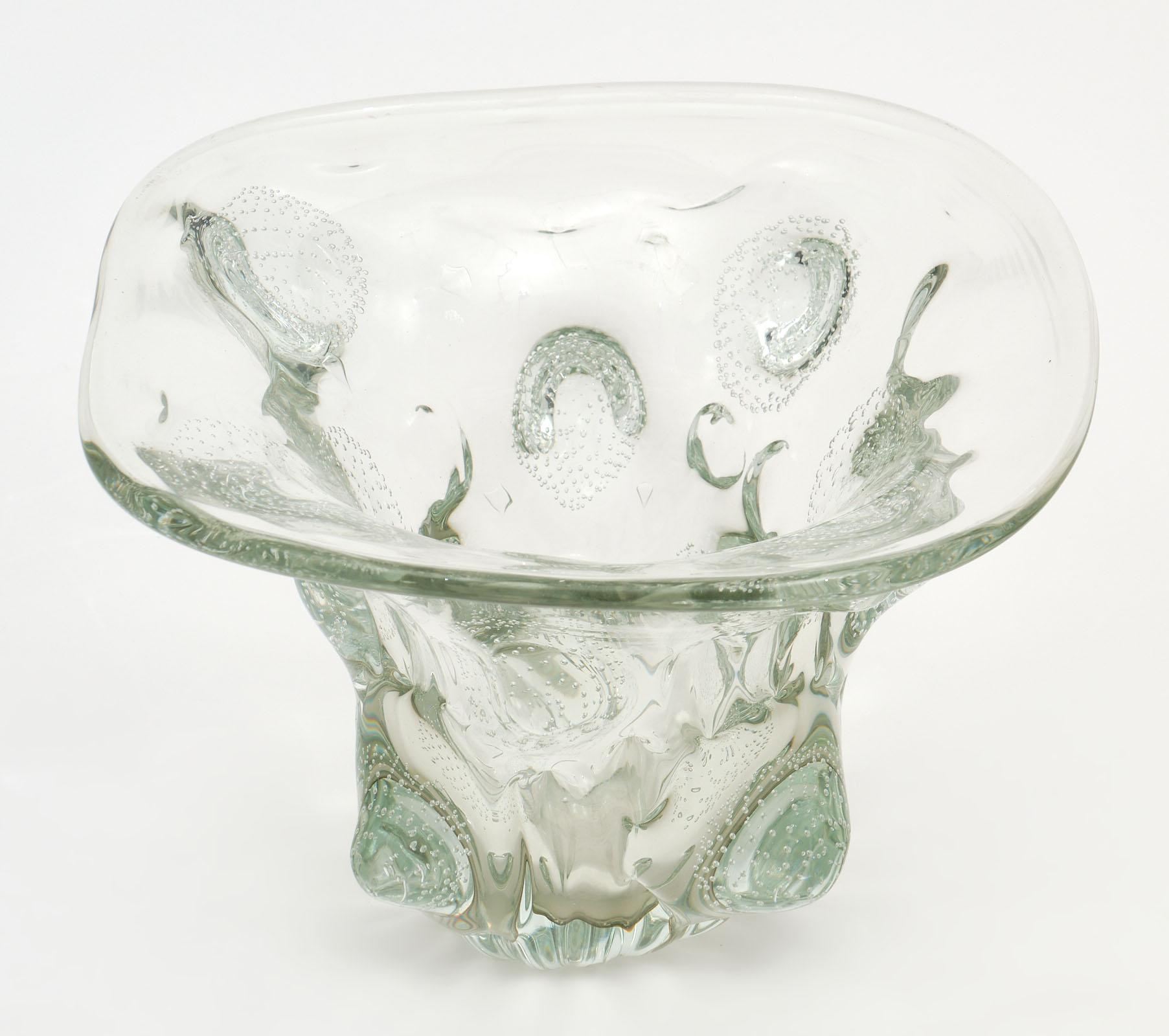 Vintage Barovier “A Bolle” Murano glass vase in a clear glass tone. We love the organic shapes of this piece and the hand blown detail. It is a stunning piece of art and features the bubbles within the glass that give it its name.