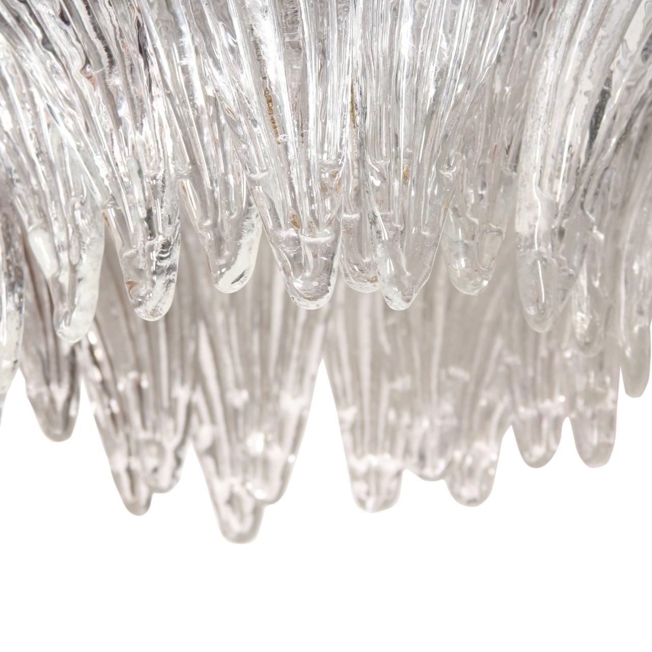 A large Barovier and Toso flush mount light fixture featuring one round tier of overlapping large, curved hand-blown frosted palm leaves in the Graniglia technique.

Signed with Barovier & Toso silver label.

Italy, circa 1970-1980.

Wired for USA;