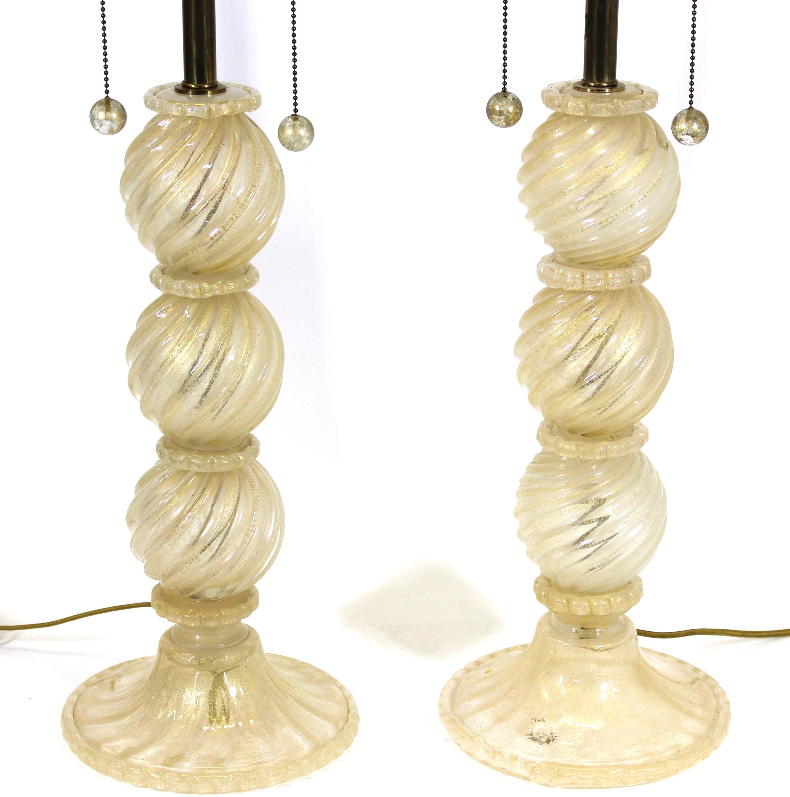 Barovier attributed pair of Italian Hollywood regency style Murano glass table lamps with gold-flecked glass.
