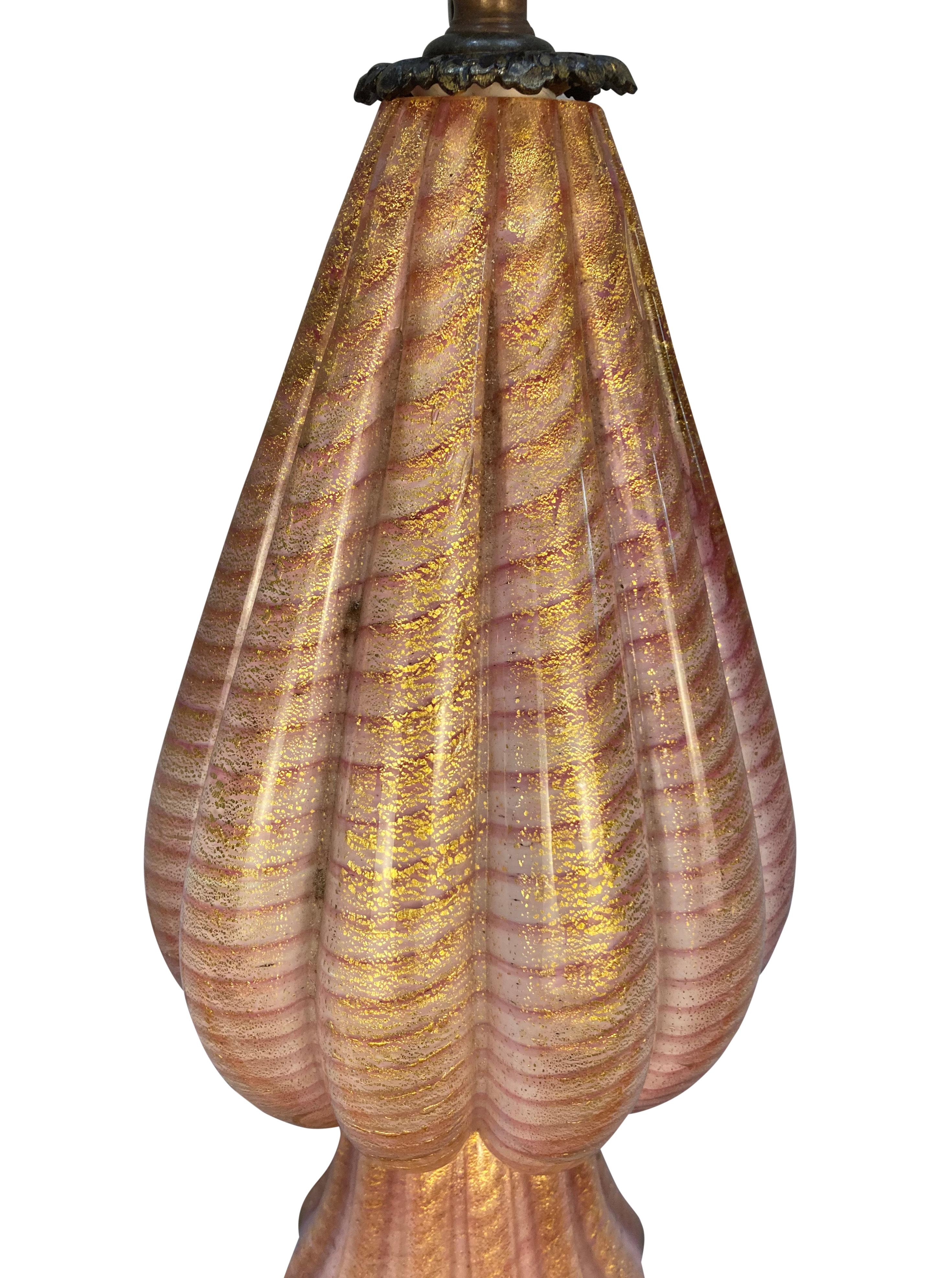 An Italian Barovier cordonato d'oro hand blown glass lamp. In pink and gold with bronze fittings.