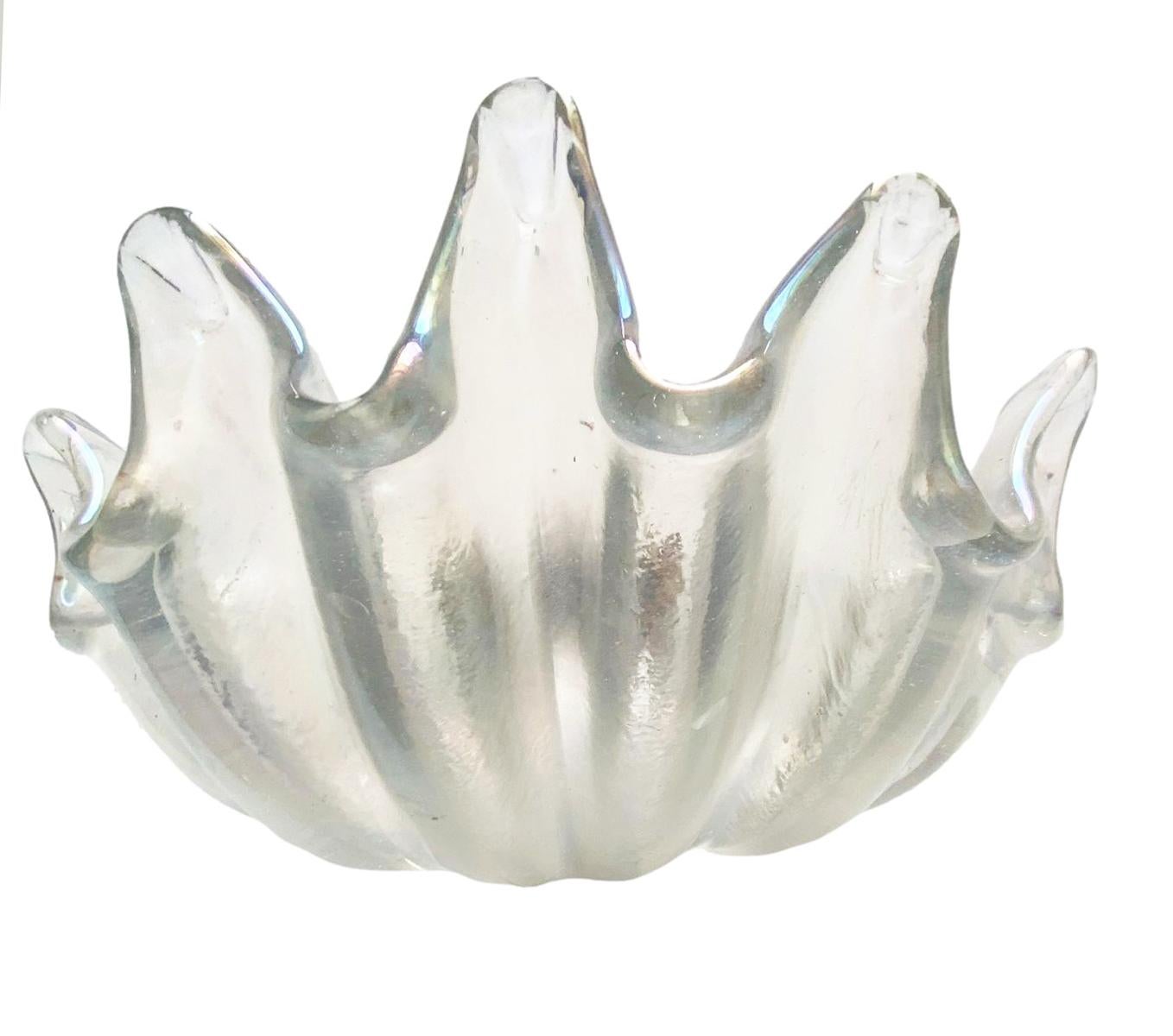 Ercole Barovier for Barovier & Toso rare shell applique in heavy transparent iridescent glass with deep ribs and pronounced lobes, Italy, circa 1950 
The applique in hand-blown crystal with brass inserts is elegant and imposing, it emanates a warm
