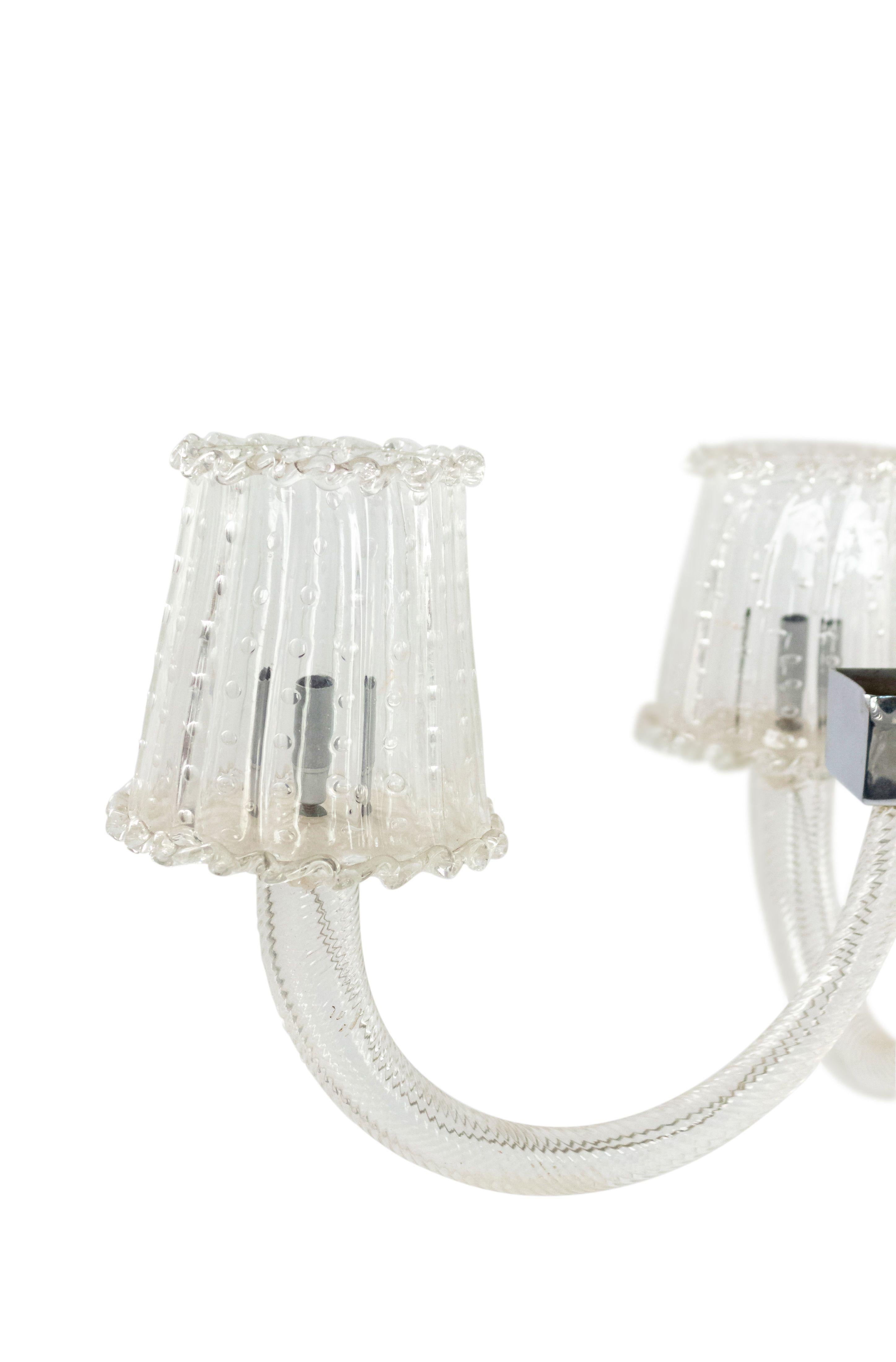 Italian (1940's) Venetian Murano clear swirl design glass 10 arm chandelier emanating from a rectangular chrome frame holding clear bubble glass shades. (att: BAROVIER ET TOSO)