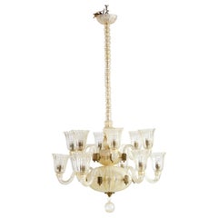Lampadario a 12 bracci in vetro infuso oro Art Deco italiano Barovier