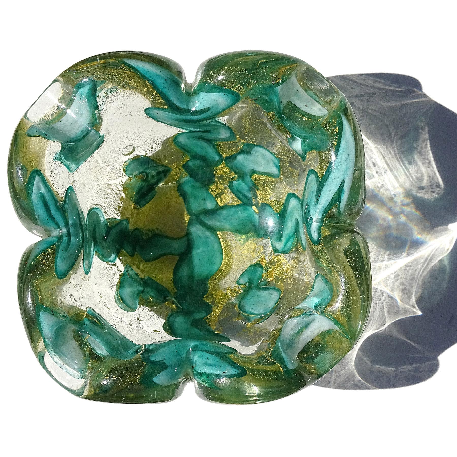 Beautiful vintage Murano hand blown gold flecks and emerald green abstract swirl design Italian art glass bowl or ashtray. Documented to designer Ercole Barovier for the Barovier e Toso company. The bowl is profusely filled with heavy gold leaf