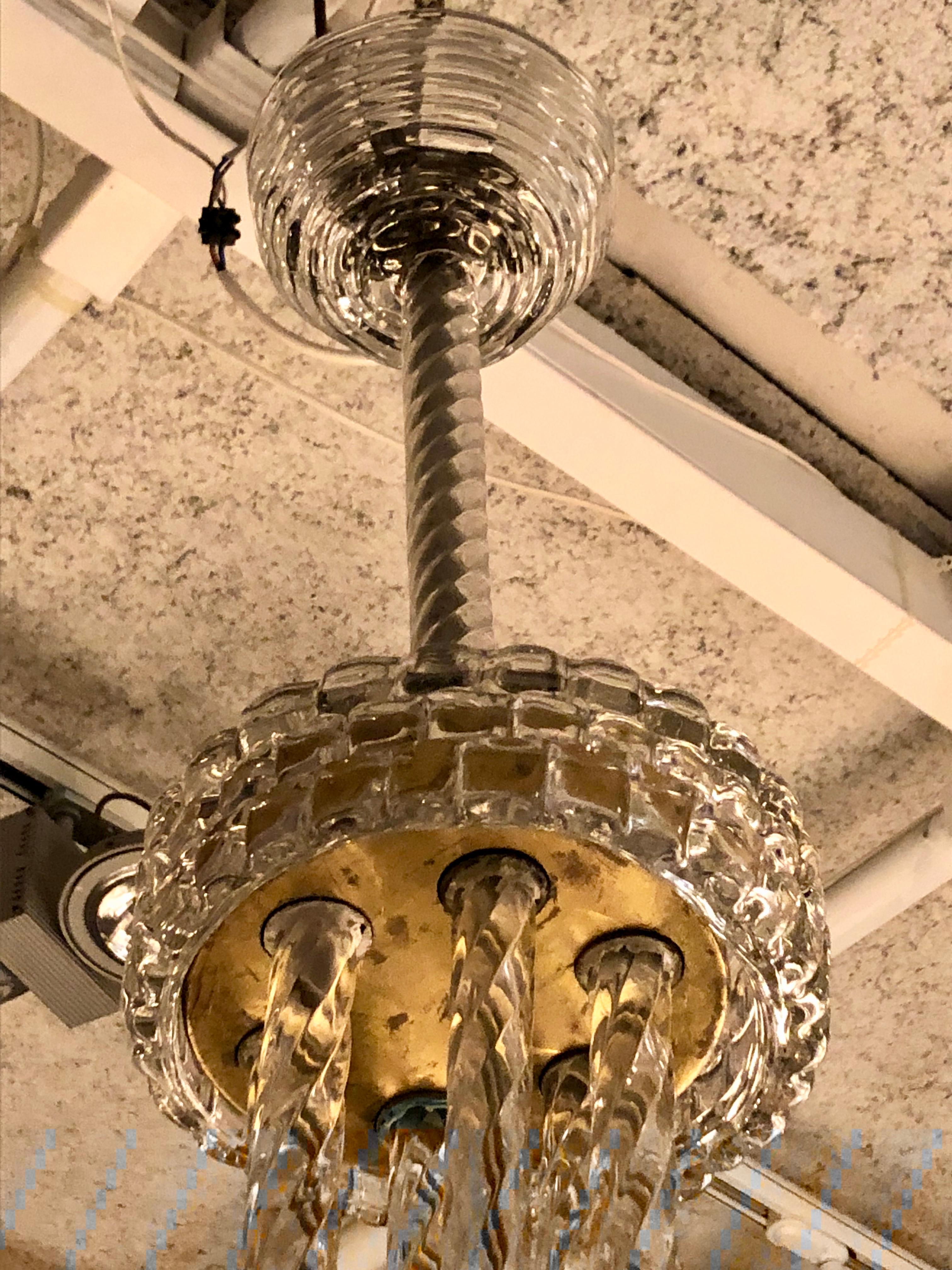 Rare Barovier blown glass chandelier in thick glass with a very original and interesting design.
Hard to find on the market, 100% original from the period. We keep the original paint on the upper part but it can be arranged.
Easy to disassemble