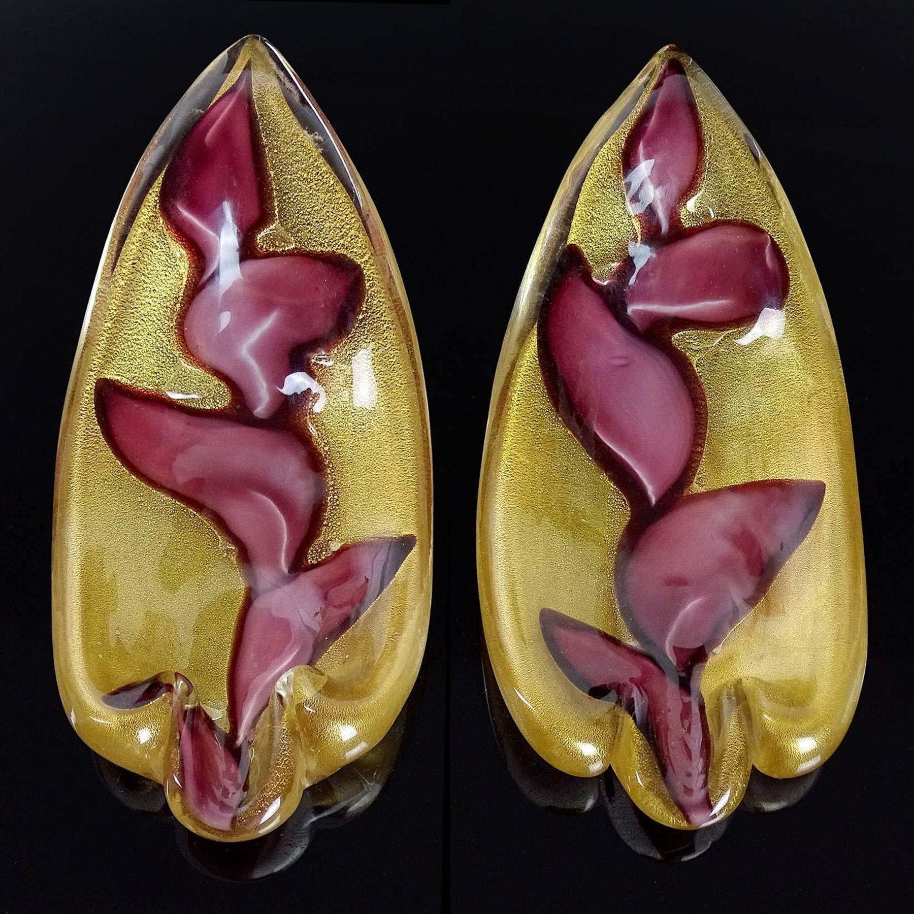 Beautiful vintage Murano hand blown gold flecks and purple leaf design Italian art glass low dishes, knife / spoon rests or personal ashtrays. The design is documented to Ercole Barovier for Barovier e Toso, similar to the 