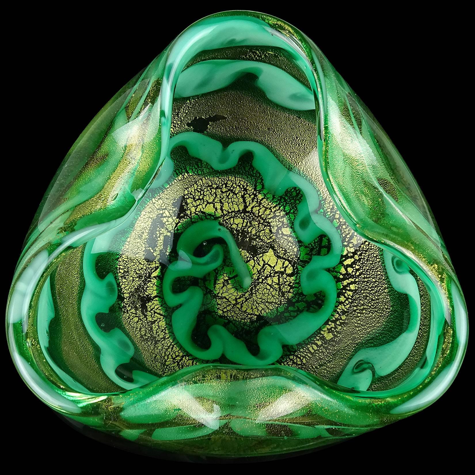 Beautiful large Murano hand blown gold flecks and green swirling design Italian art glass bowl. Documented to designer Ercole Barovier for the Barovier e Toso company, circa 1955-1960. Profusely filled with gold leaf. This particular design has