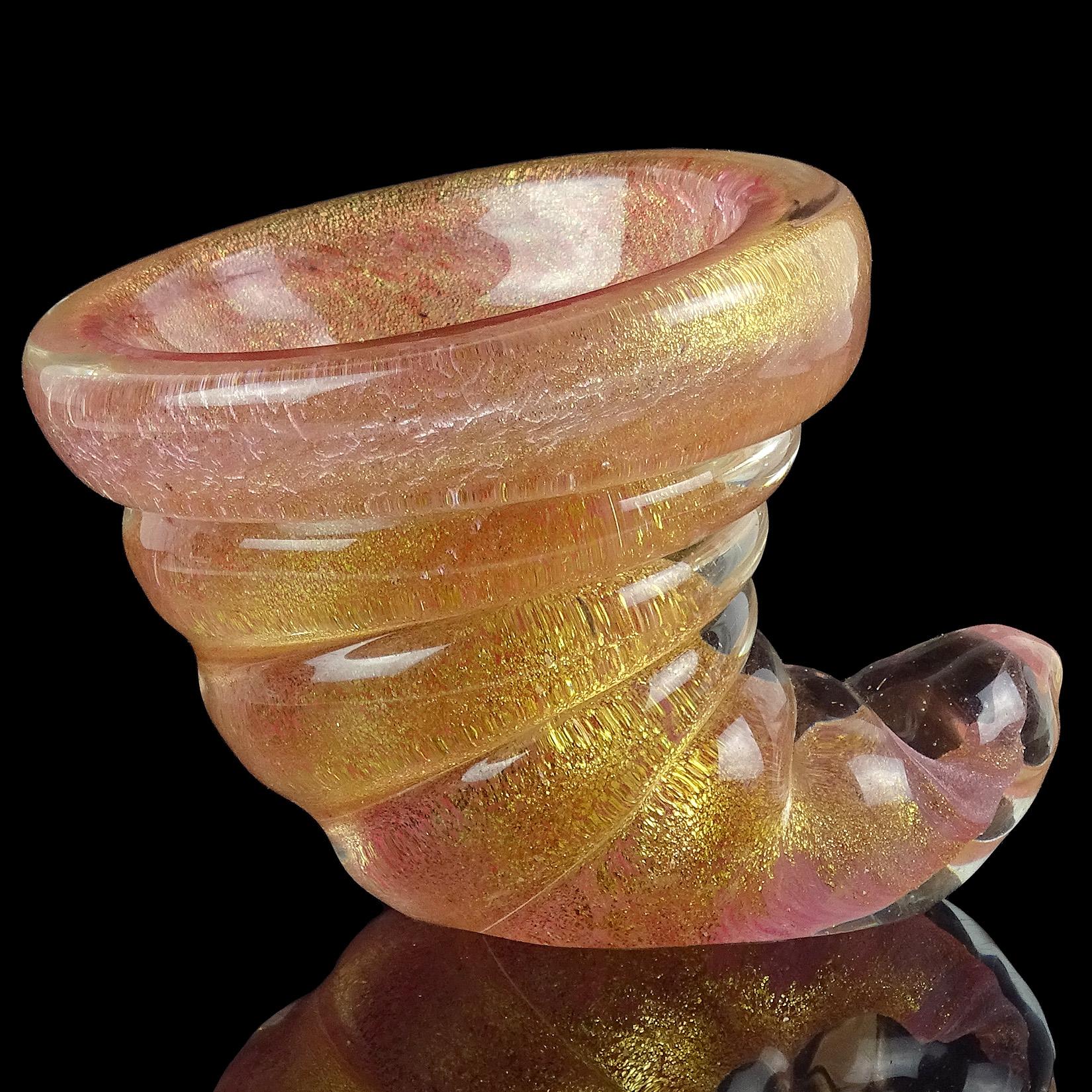 Please per item (4 available). Beautiful vintage Murano hand blown pink and gold flecks Italian art glass twisting seashell dishes / sculptures. Documented to the Barovier e Toso company. The mouth of the shell is shallow, great for keeping a ring