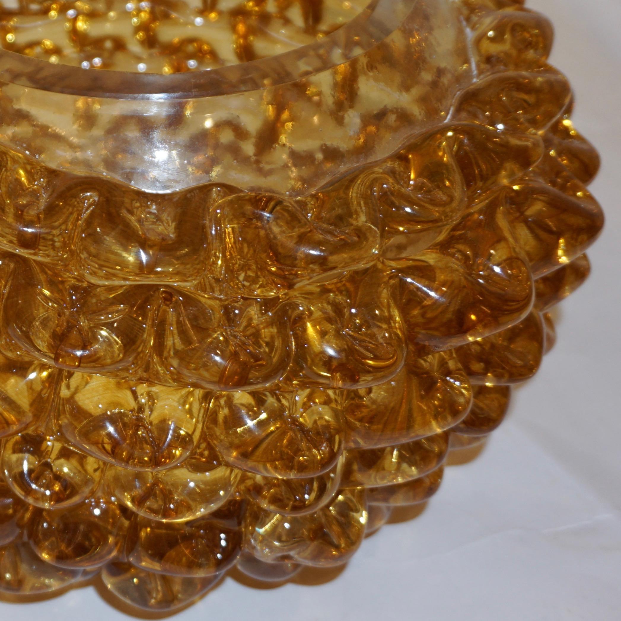 Exquisite mid-20th century vase or bowl by Barovier & Toso with Art Deco flair in rich blown whiskey gold Murano art glass, hand decorated with the technique Rostrato: spikes of glass individually hand pulled in relief. Rostrato is a distinctive