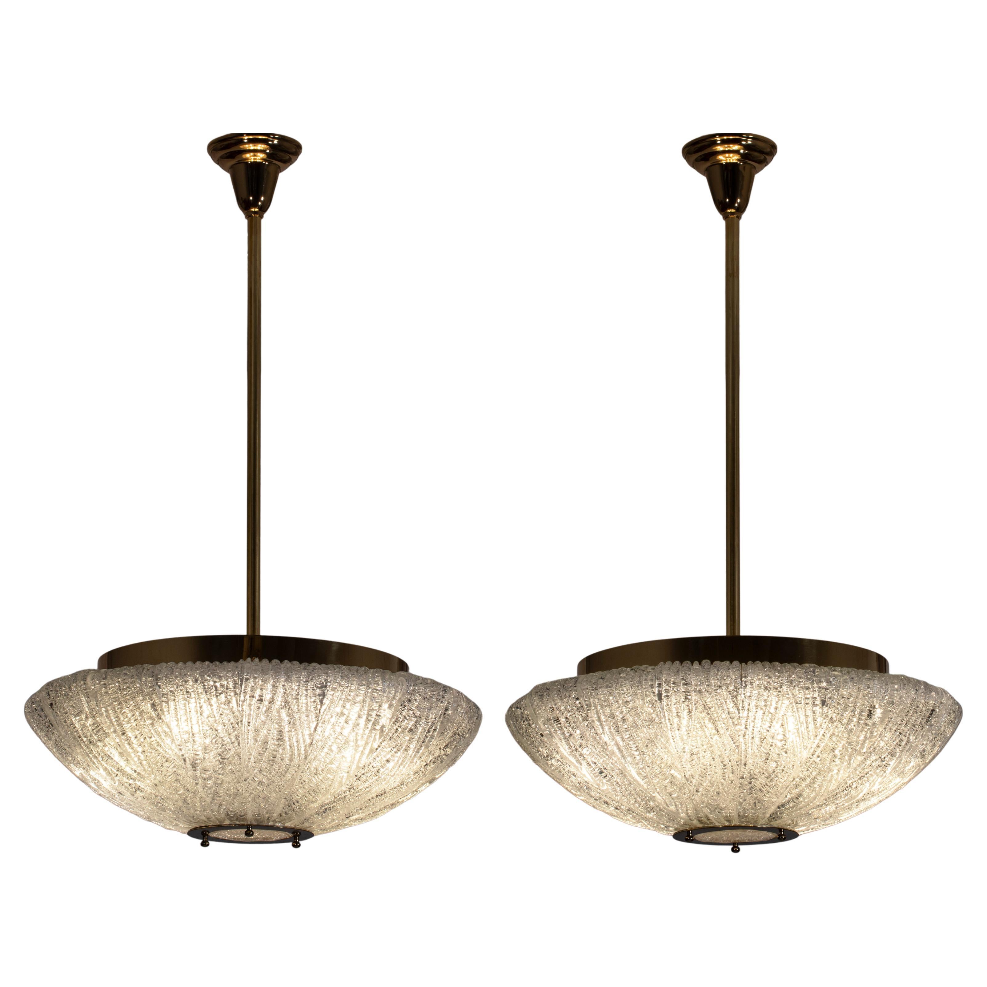 Barovier & Toso Attributed, Pair of Murano Colorless Glass and Brass Chandeliers