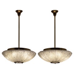 Barovier & Toso Attributed, Pair of Murano Colorless Glass and Brass Chandeliers