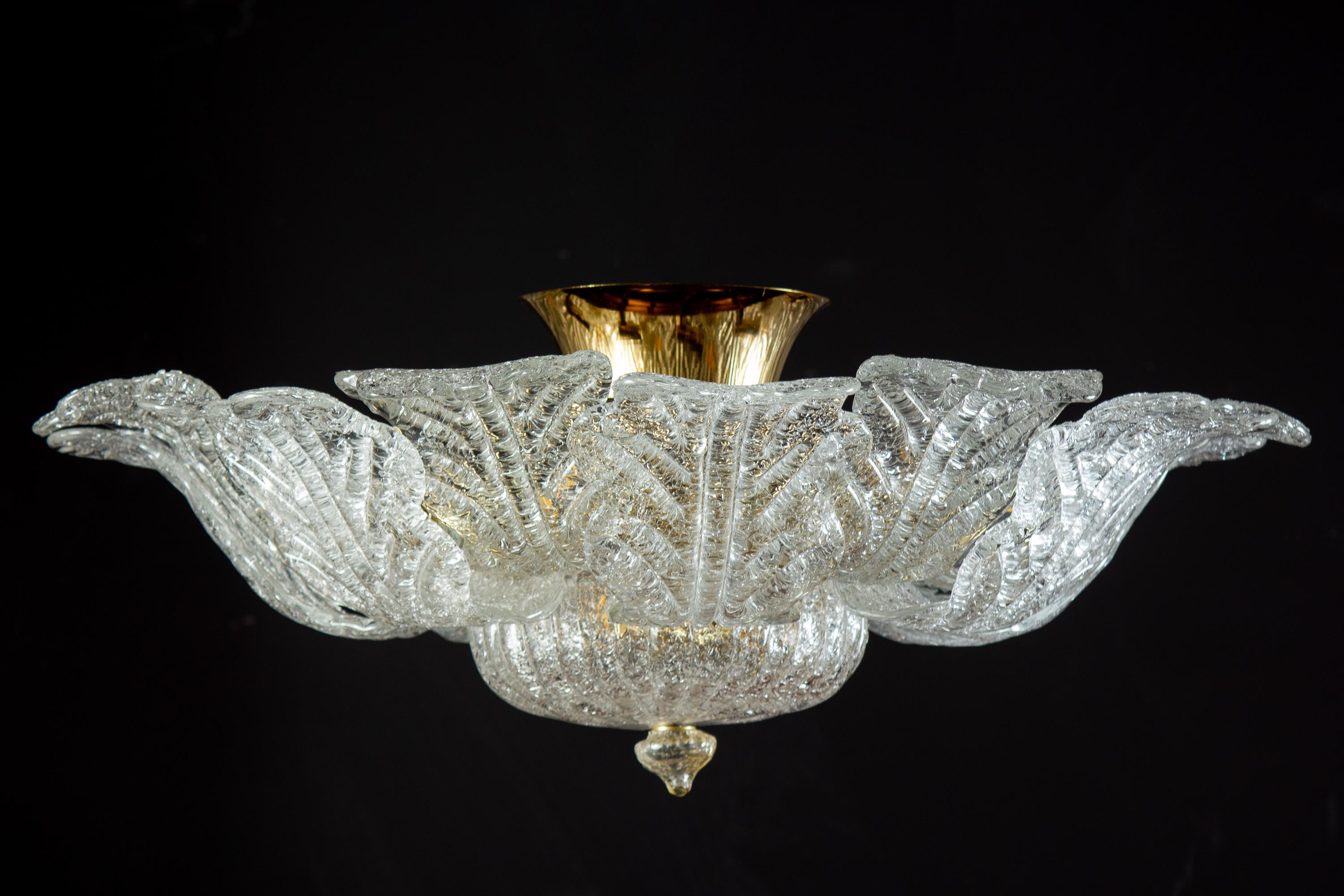Fabulous Barovier & Toso Murano art glass ceiling lights whit a Brass frame ,made of precious hand blown ice color leaves glasses . A glass bowl as a bottom. This beauty has the look of a precious big flower. Cleaned and re-wired, in full working