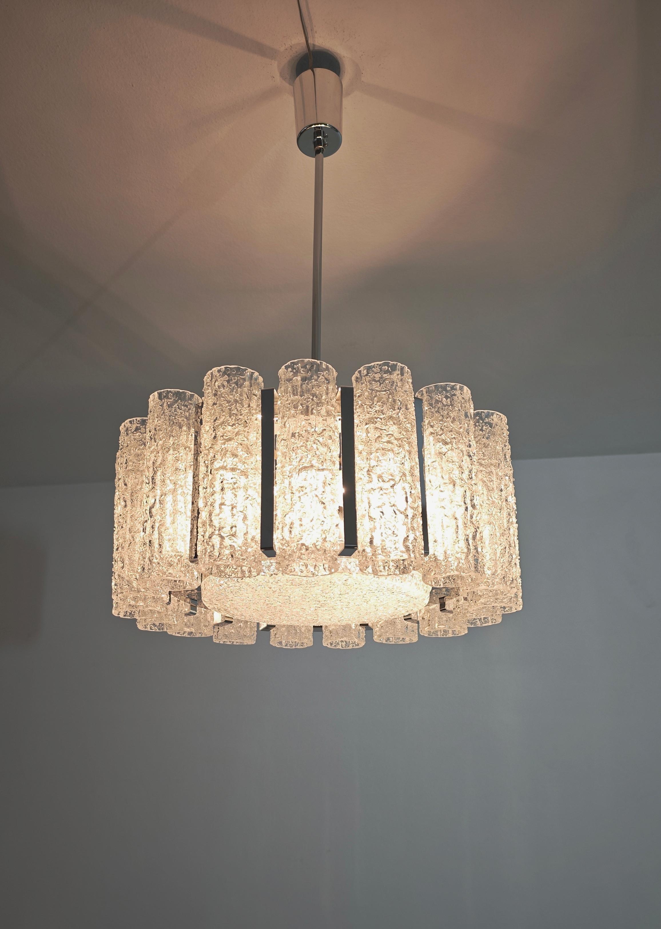 Barovier & Toso. Chromed metal chandelier. Central diffuser and seventeen prismatic elements in dewy glass. Each individual glass element is separated by chromed brass plates. A truly beautiful piece. Please watch the video and photos carefully,