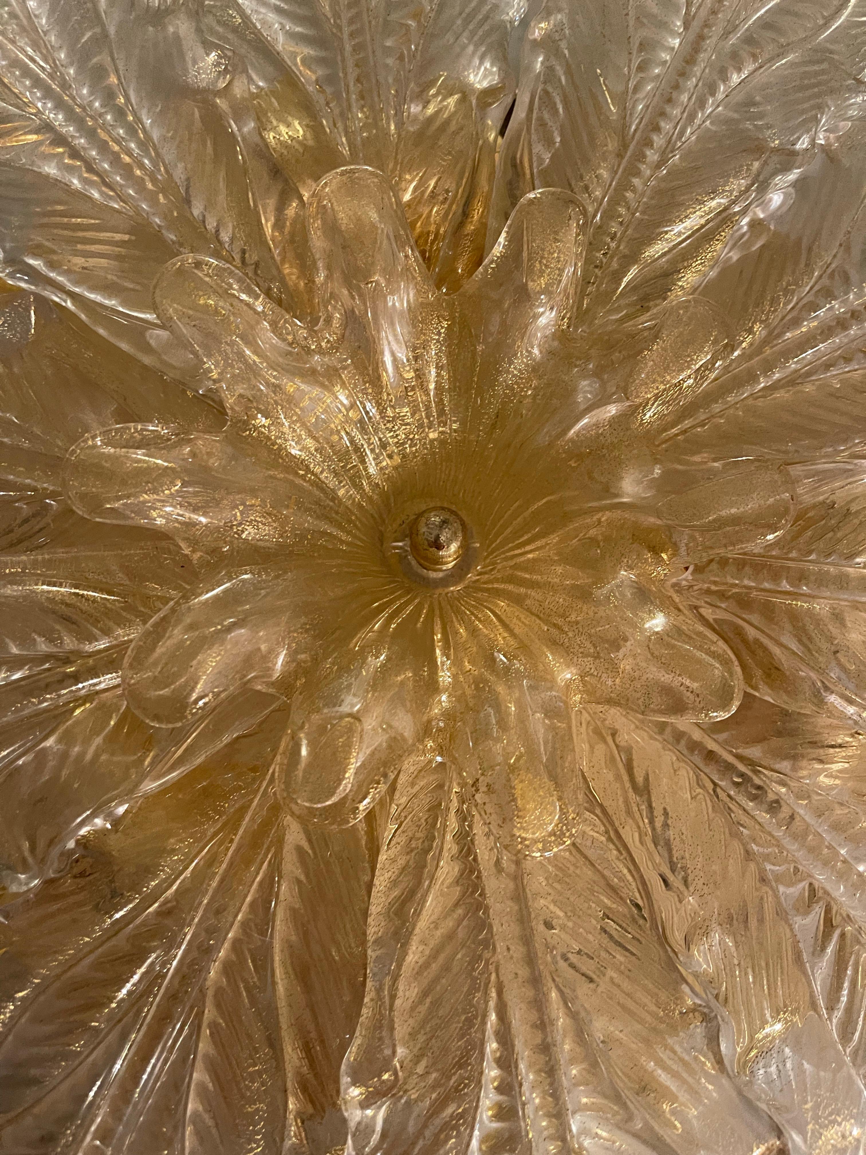 Exceptional Barovier & Toso Flush Mount oversized gold glass Murano with metal structure. The Design and the quality of the gold glass make this piece the best of the italian Design.
This unique Barovier & Toso ceiling light in gold glass murano are