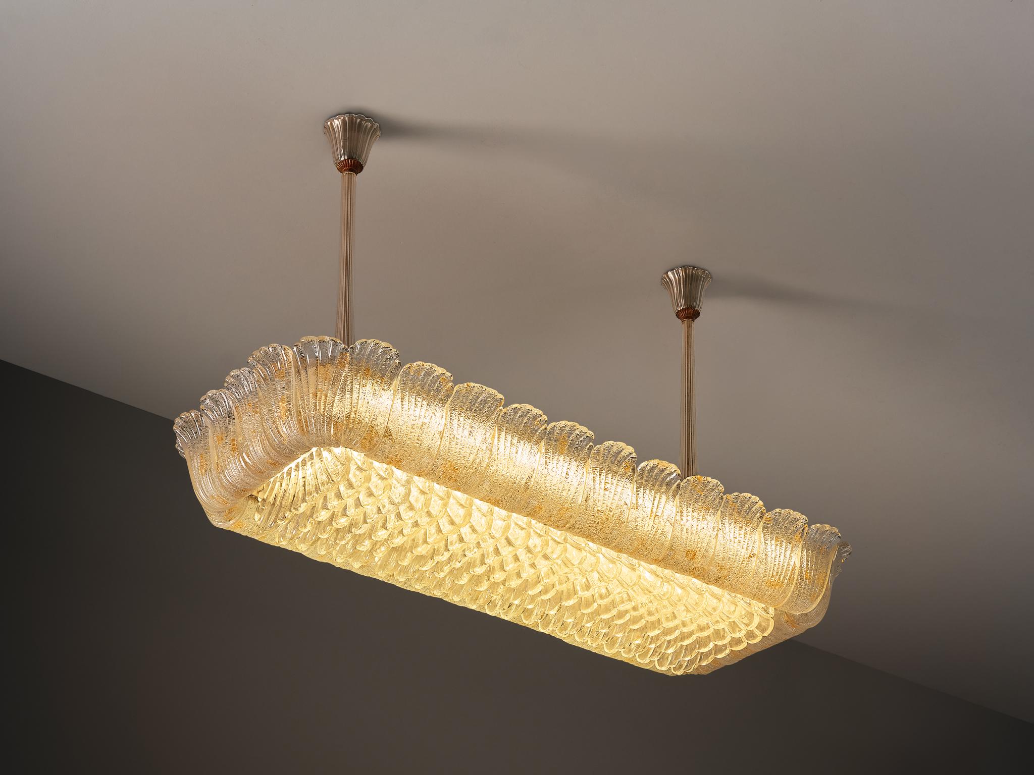Barovier&Toso, chandelier, crystal glass, gold leaf, brass, Italy, 1940s

This impressive chandelier by Barovier & Toso, crafted in Italy during the 1940s, reflects the studio’s centuries-old mastery of Venetian glassmaking. Made of ribbed crystal