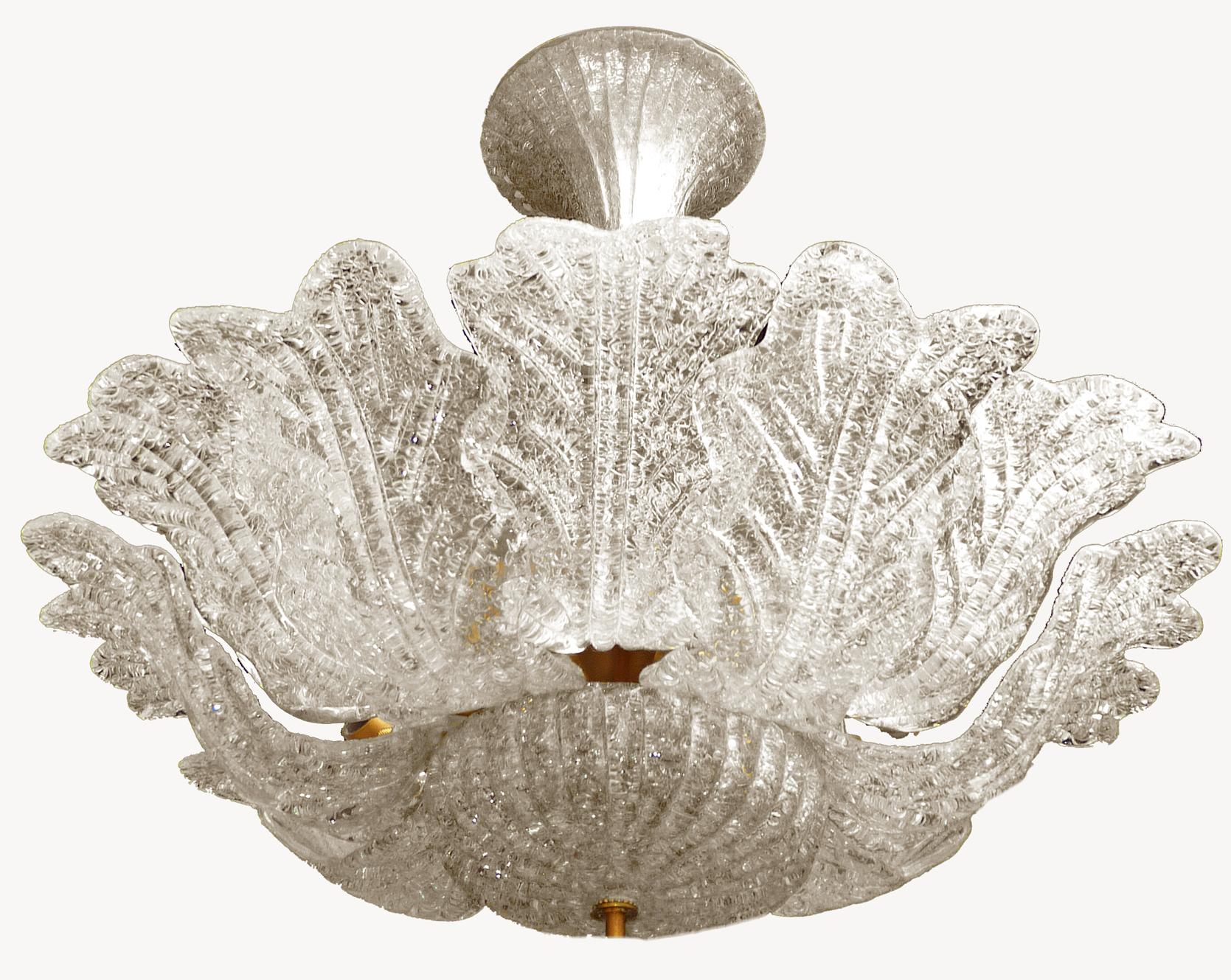 Gorgeous Italian Murano glass flush mount attributed to Barovier & Toso with hand blown textured glass
Measures:
Diameter 66 cm
Height 66 cm
Eight light bulbs E 14/ Good working condition.
Weight - 12 Kg/ 28 lb.
Assembly required. Bulbs not included.