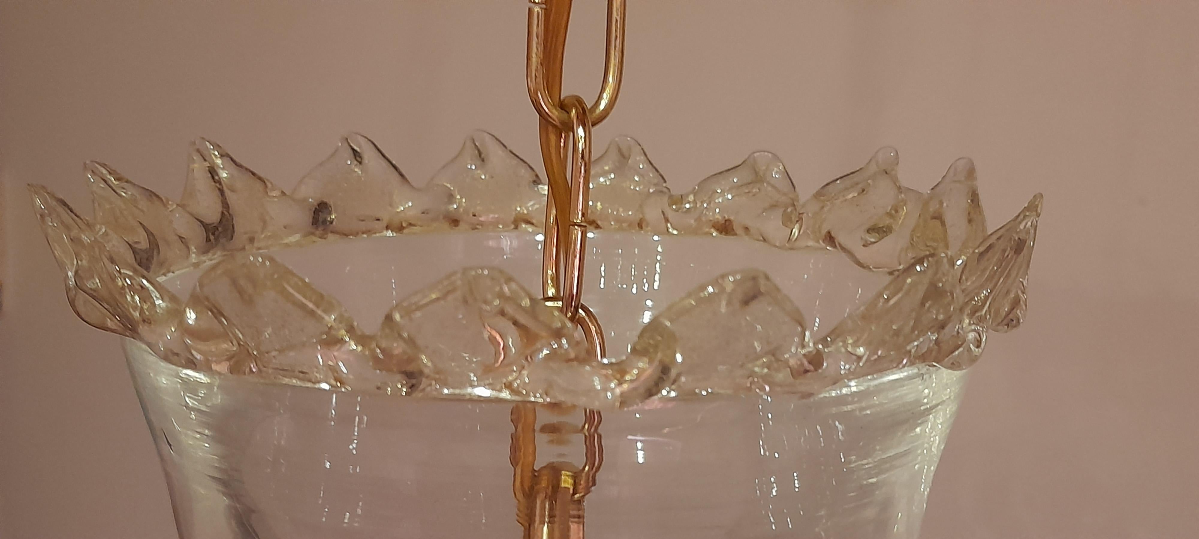 This pendant lamp is a fine example of 1950s vintage design, made by the prestigious Venetian manufacturer Barovier & Toso.
Features:
Dimensions: H 55 cm x Ø 35 cm
Material: Clear bulicant glass, a craft technique that creates a decorative bubble
