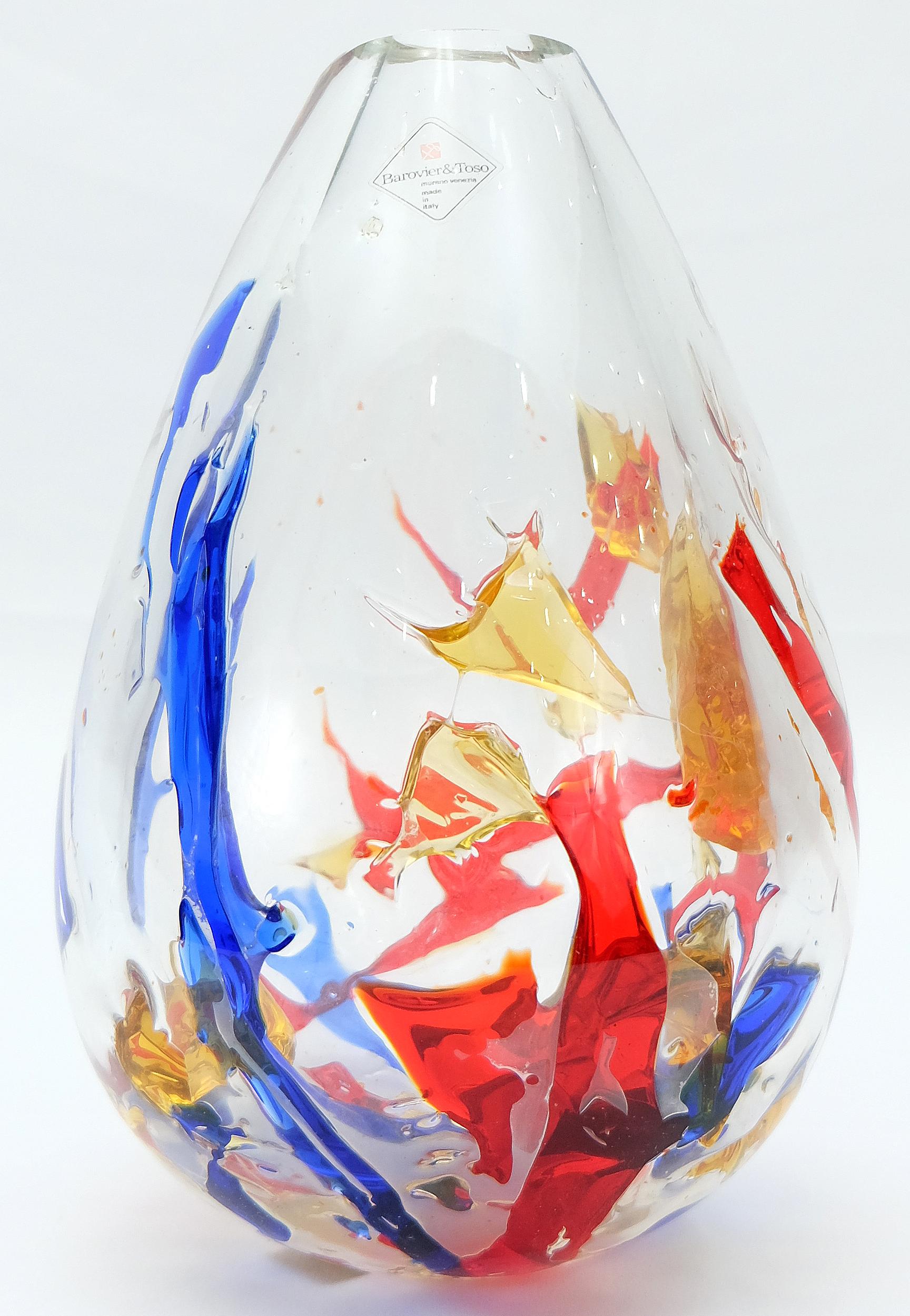 Barovier & Toso Mehrfarbige Vase aus Muranoglas

Zum Verkauf angeboten wird eine fabelhafte mundgeblasene Barovier & Toso Multi-Color Murano-Glas-Vase. Dieses spektakuläre Kunstwerk ist auf dem Sockel signiert und trägt noch alle