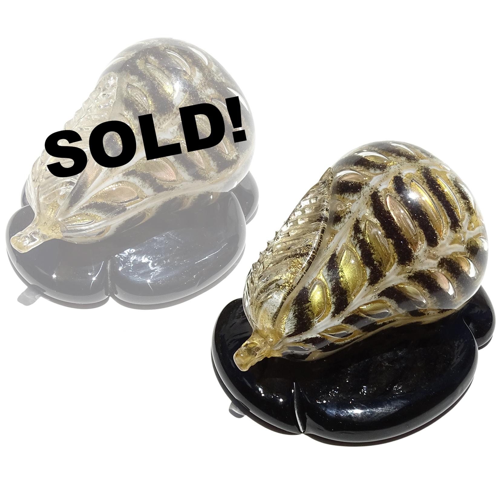ONLY 1 Left! Beautiful and rare Murano hand blown black pigments over white and gold flecks Italian art glass pear paperweight. Documented to designer Ercole Barovier for the Barovier e Toso company. Created in the Graffitto Barbarico design, and