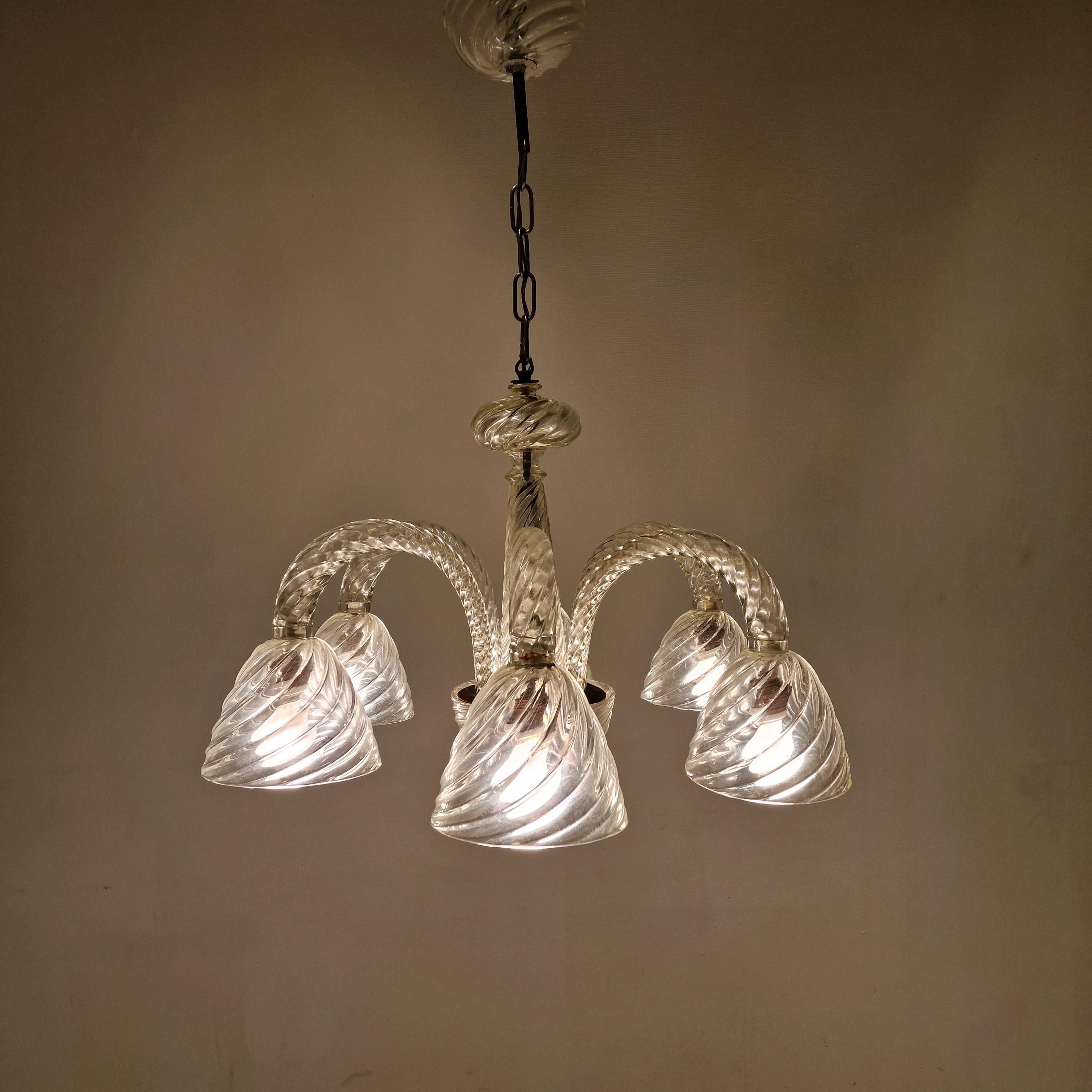 Very charming chandelier made by the glassworks Barovier & Toso in the 1950s. 

The Murano glass chandelier is composed with six arms and six lamp lamp shades.

The wiring has been checked by a professional and is suitable for all countries around