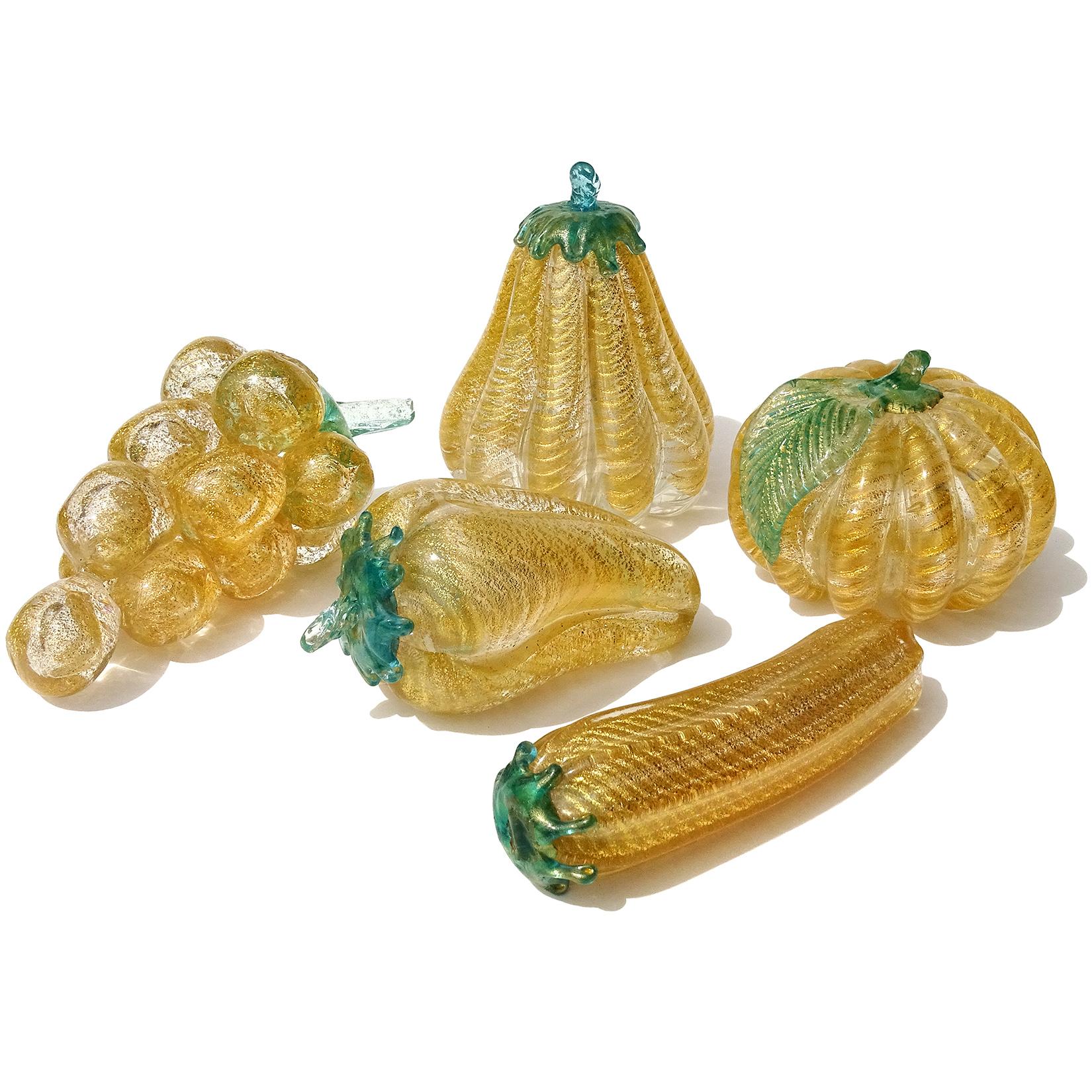 Gorgeous set of vintage Murano hand blown gold flecks Italian art glass vegetables and fruit sculptures. Attributed to the Barovier e Toso Company. There is a large grape bunch, a zucchini, a pepper, and 2 different gourd shapes. Each piece is