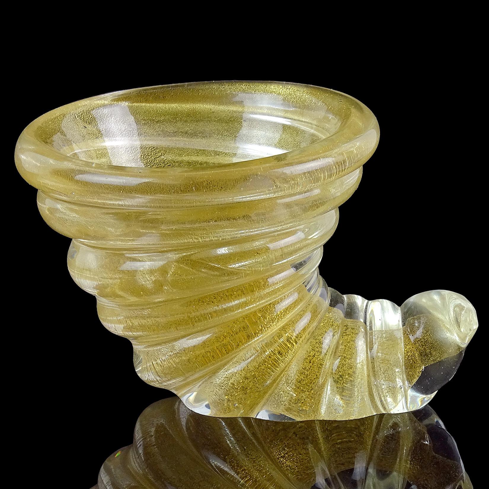 Please per item (3 available). Beautiful vintage Murano hand blown gold flecks Italian art glass twisting seashell dishes / sculptures. Documented to the Barovier e Toso company, with original label on one of them (see photo). The mouth of the shell