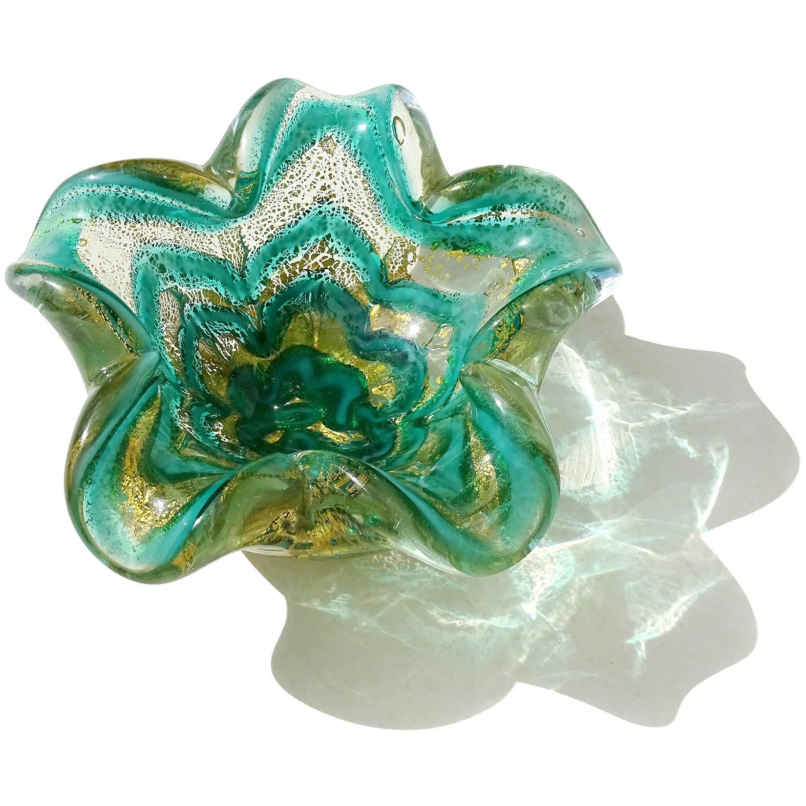 Beautiful vintage Murano hand blown green and gold flecks Italian art glass flower shaped bowl. Documented to designer Ercole Barovier for Barovier e Toso, circa 1960s. Created in the 