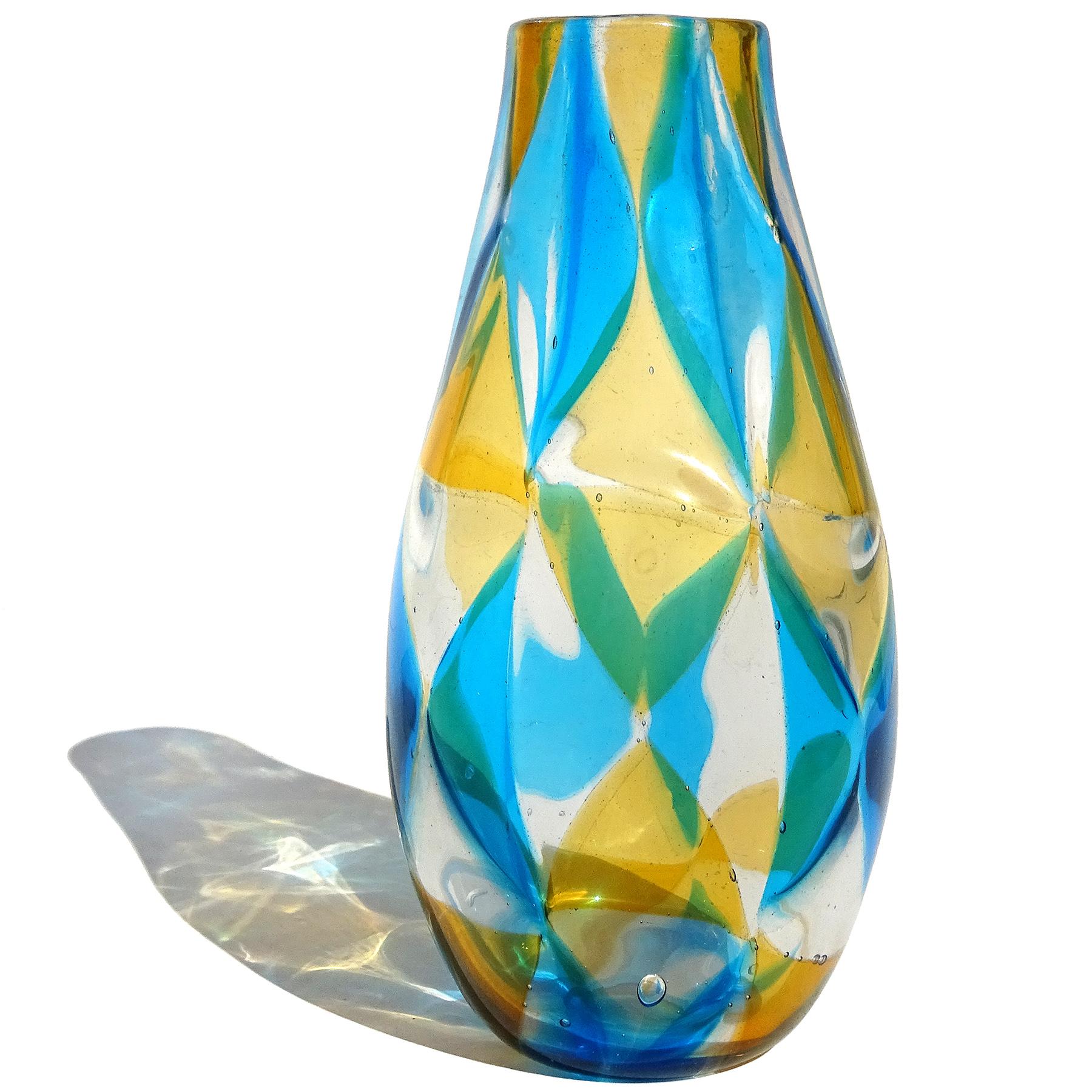 Rare and beautiful, vintage Murano hand blown orange, blue and clear triangle Tessere mosaic Italian art glass flower vase. Documented to designer Ercole Barovier, for Barovier e Toso, circa 1961-1967. Published design in many books. Created in the