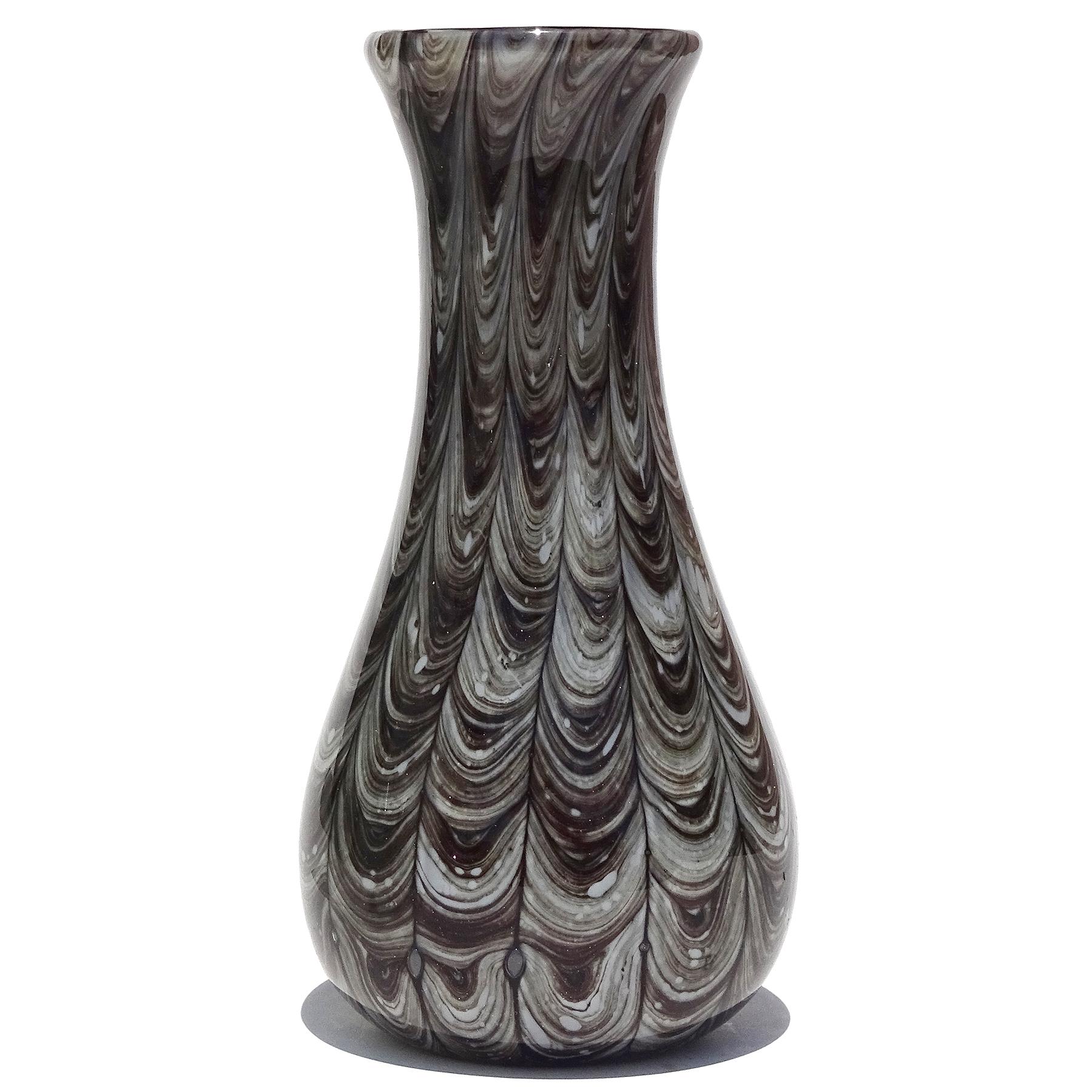 Beautiful and rare, vintage Murano hand blown grays and blacks feathered design Italian art glass flower vase. Documented to designer Ercole Barovier, for the Barovier e Toso company. Created in the Neolitico design, circa 1954. The vase still