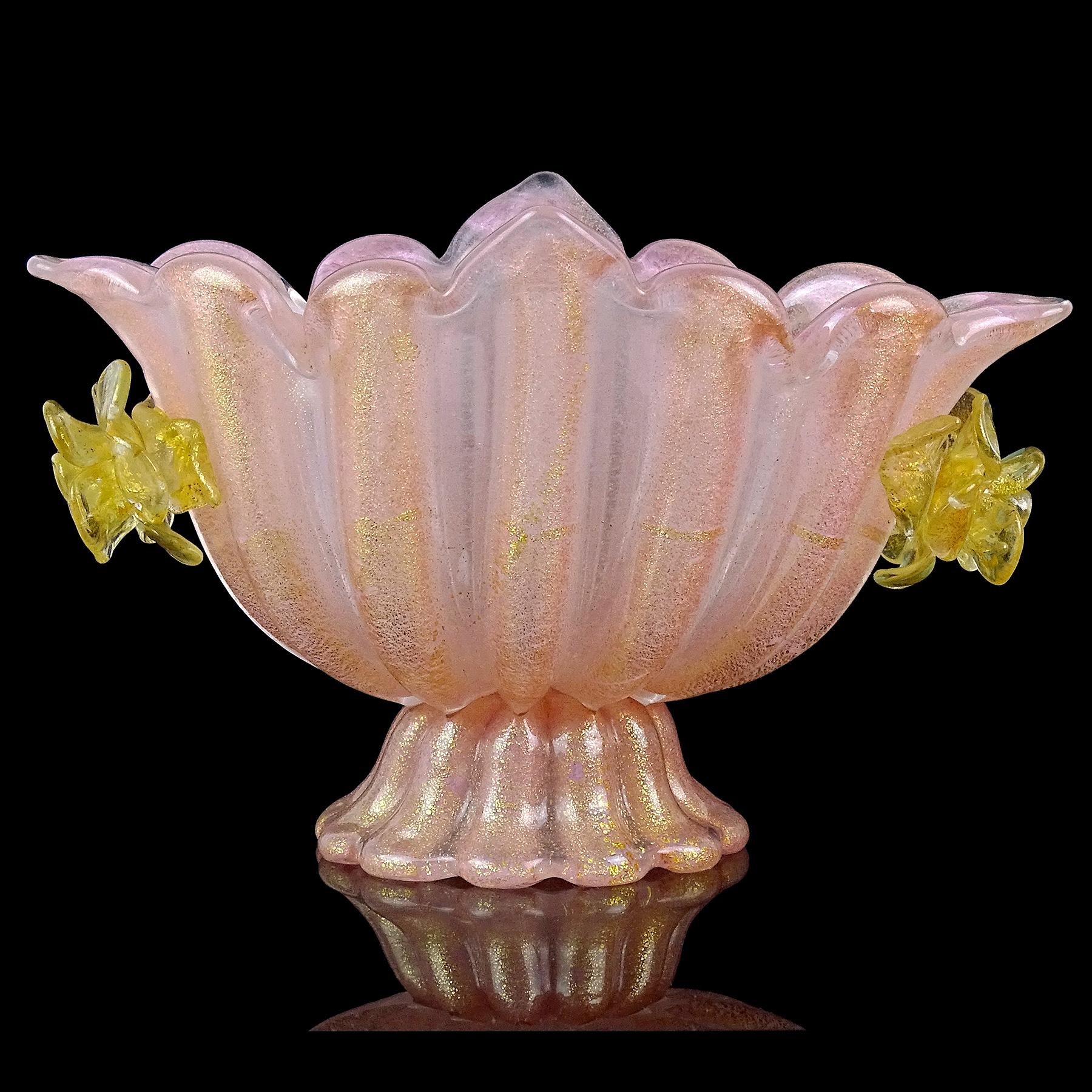 Gorgeous vintage Murano hand blown pink and gold flecks Italian art glass footed compote bowl. Attributed to designer Ercole Barovier for the Barovier e Toso workshop. Created in the 