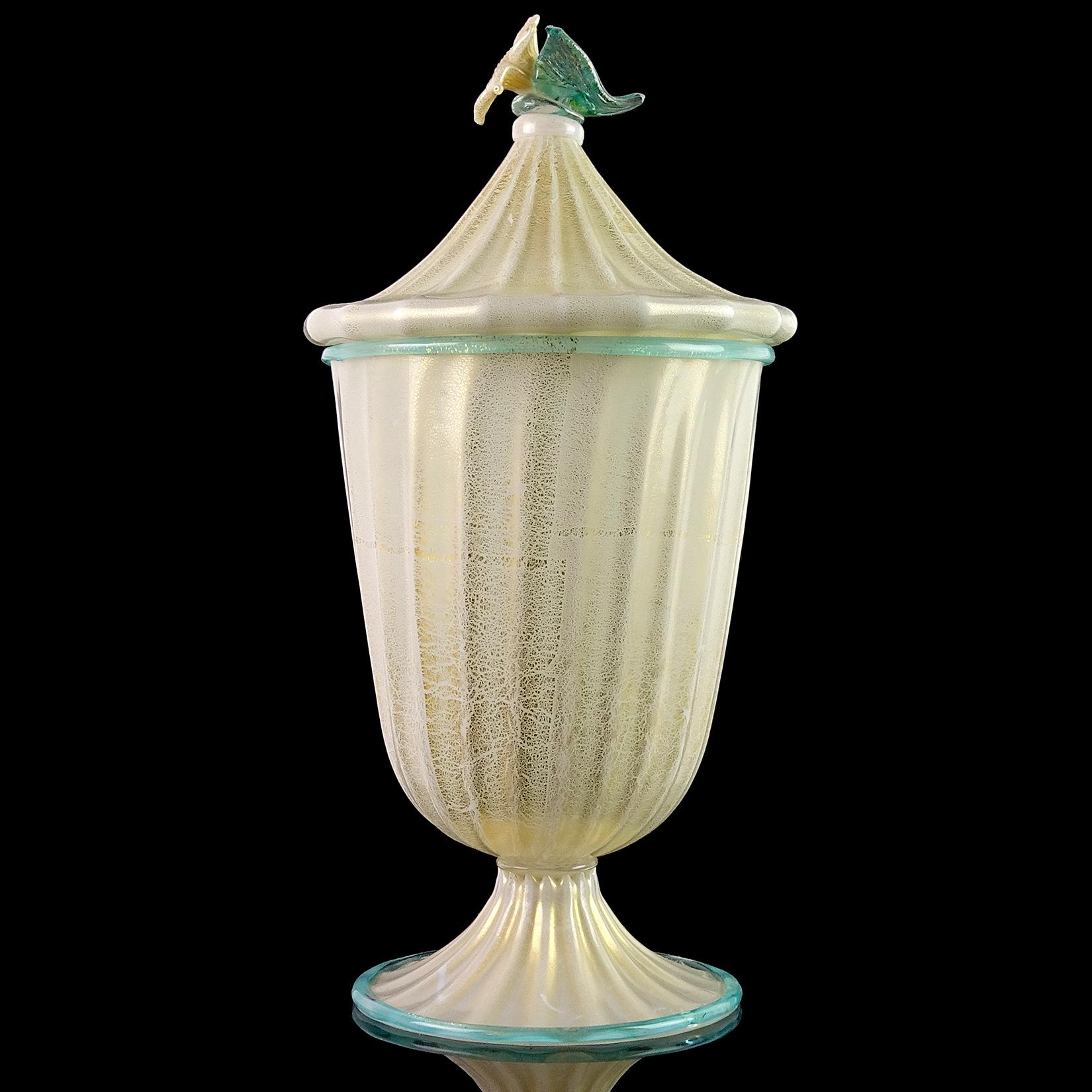 Gorgeous and large Murano hand blown white, aqua trim and gold flecks Italian art glass jar / container with flower top decoration. Attributed to the Barovier e Toso company. In the style of early Vetreria Artistica Barovier pieces I have previously