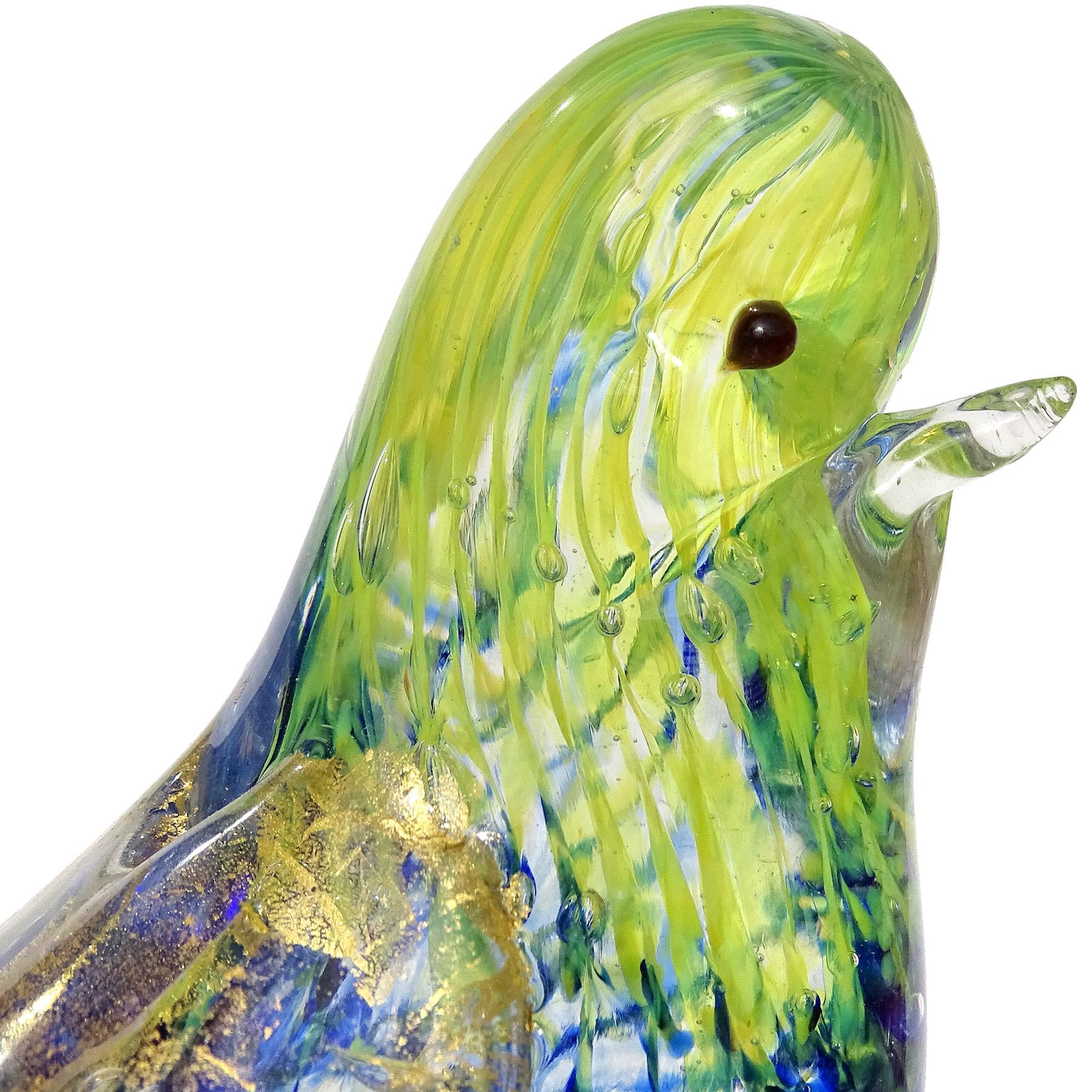 Beautiful vintage Murano hand blown bright yellow and sapphire blue spots, bubbles and gold flecks Italian art glass baby bird figurine / sculpture. Documented to the Barovier e Toso Company. The bird is made with the controlled bubble 